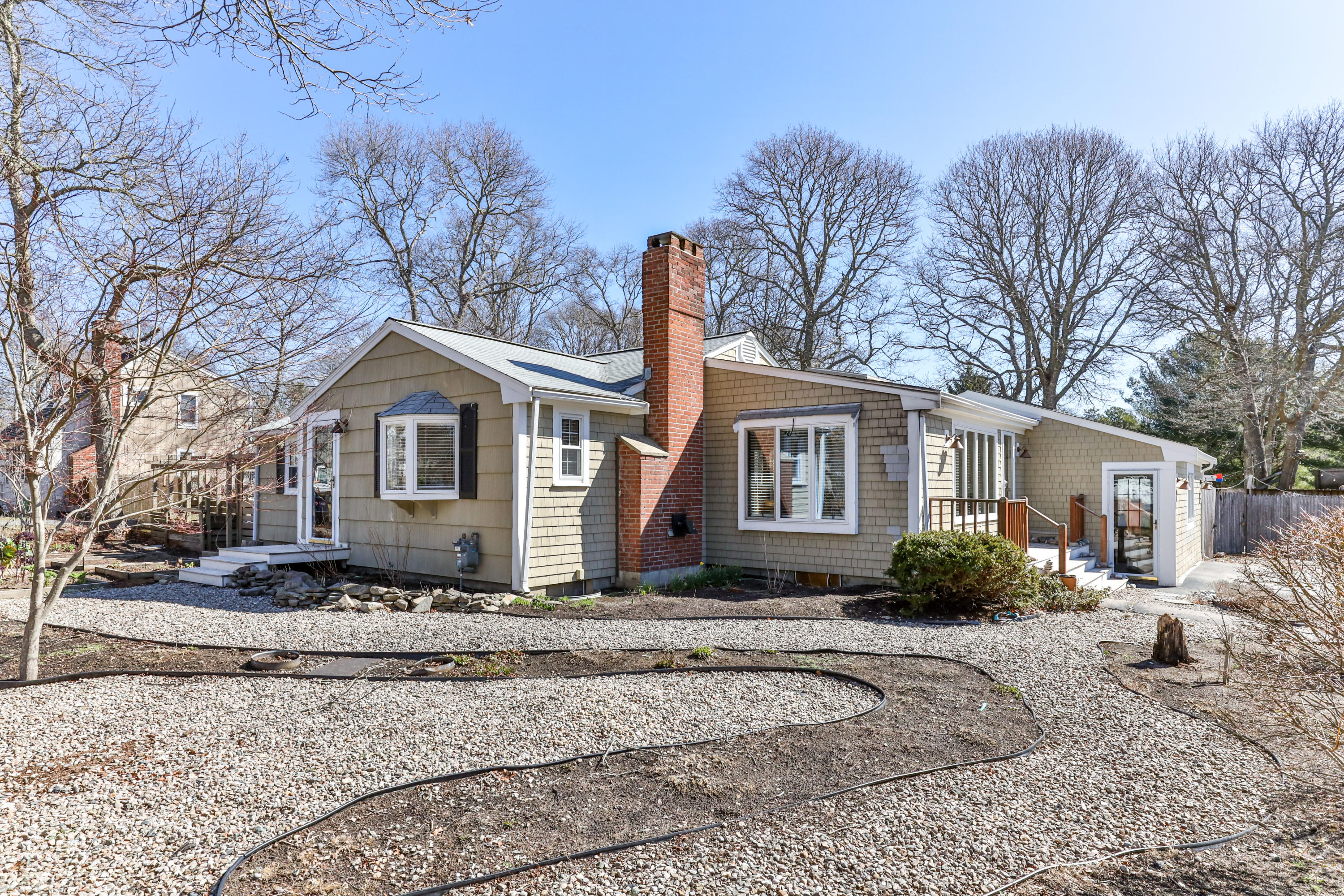 a front view of a house with yard
