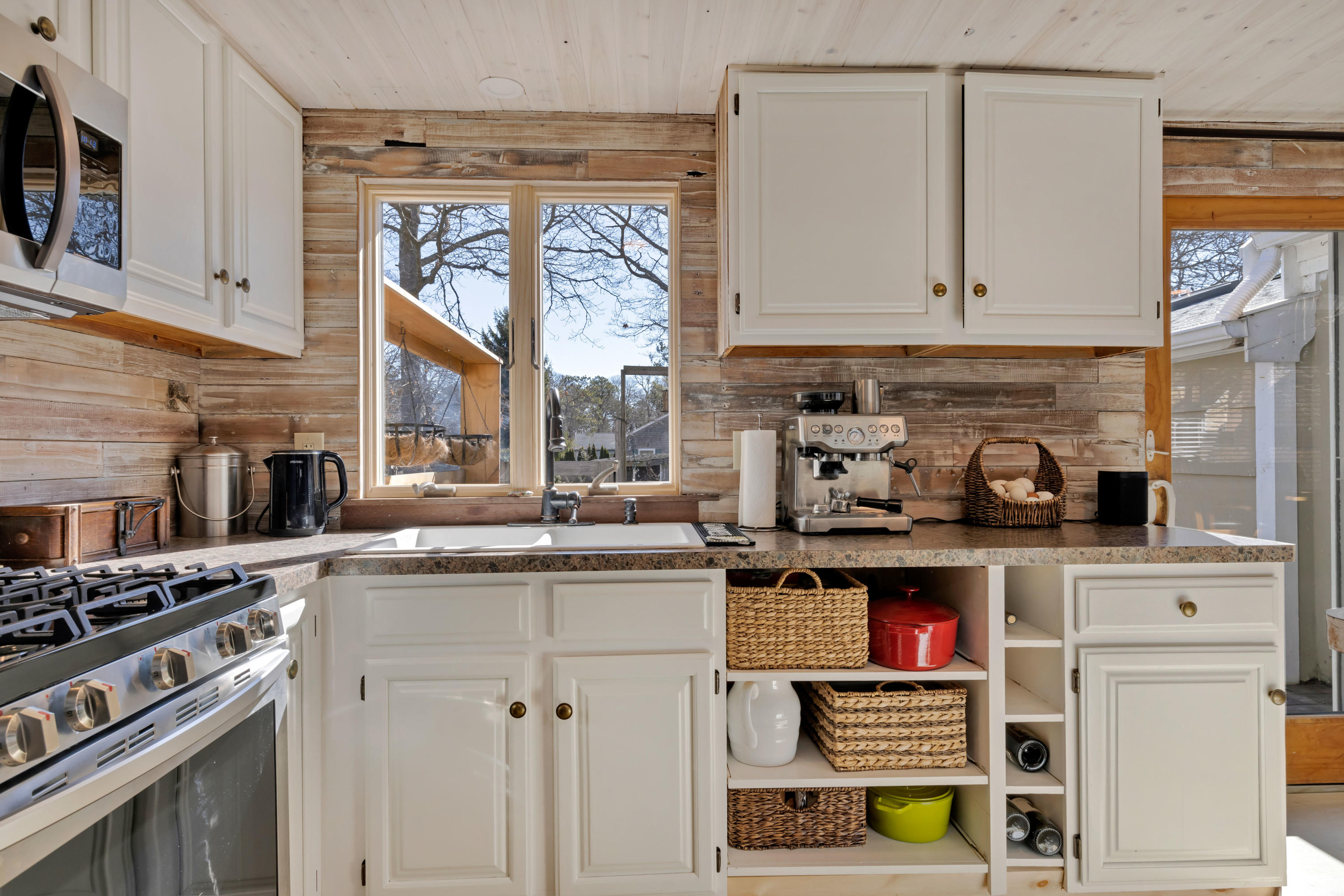 110 Kelley Road Hyannis, MA 02601 - Photo 13 of 49 a kitchen with stainless steel appliances granite countertop a stove and a sink
