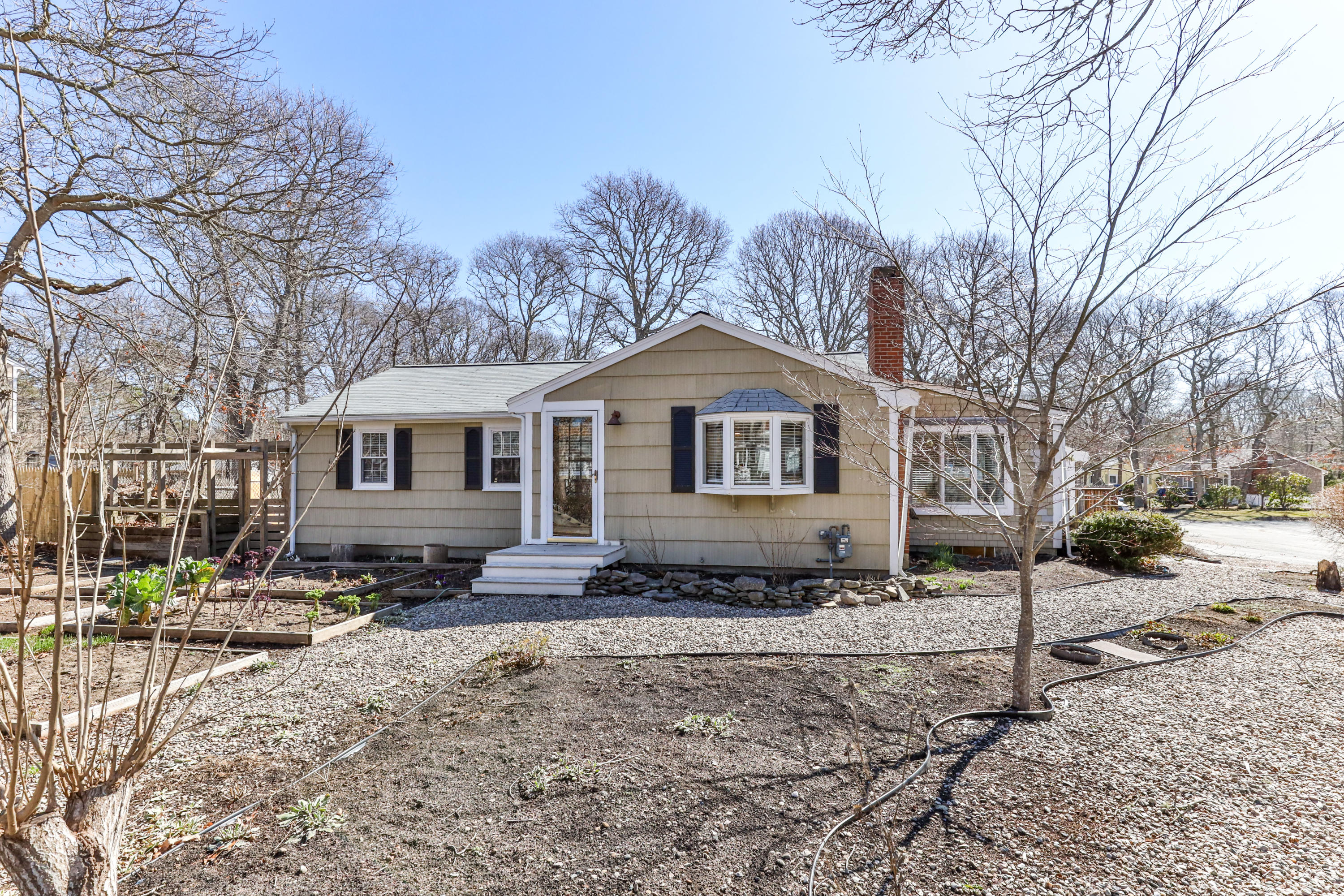 110 Kelley Road Hyannis, MA 02601 - Photo 3 of 49 a front view of a house with a yard