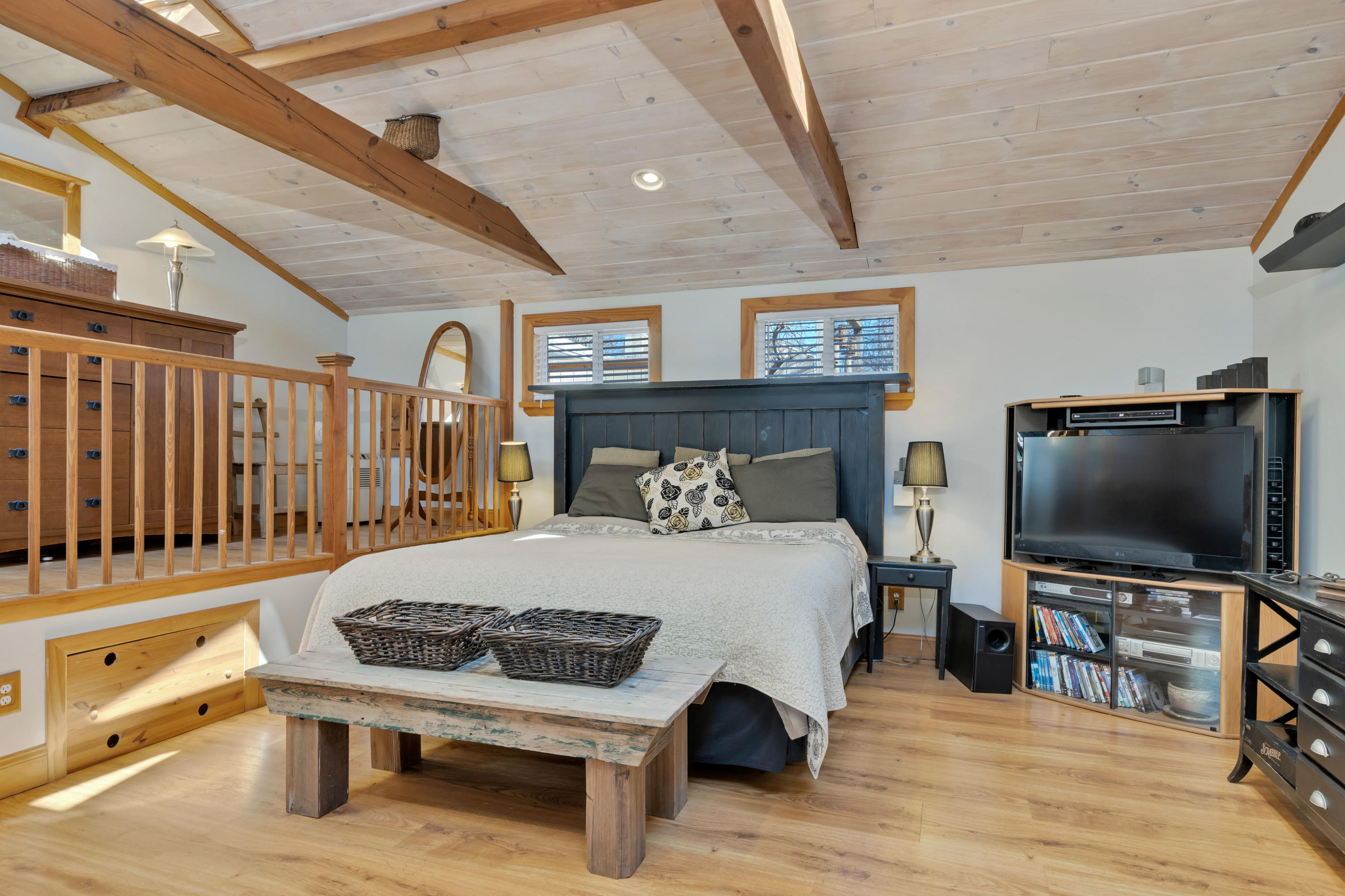 110 Kelley Road Hyannis, MA 02601 - Photo 31 of 49 a bedroom with furniture and a flat screen tv