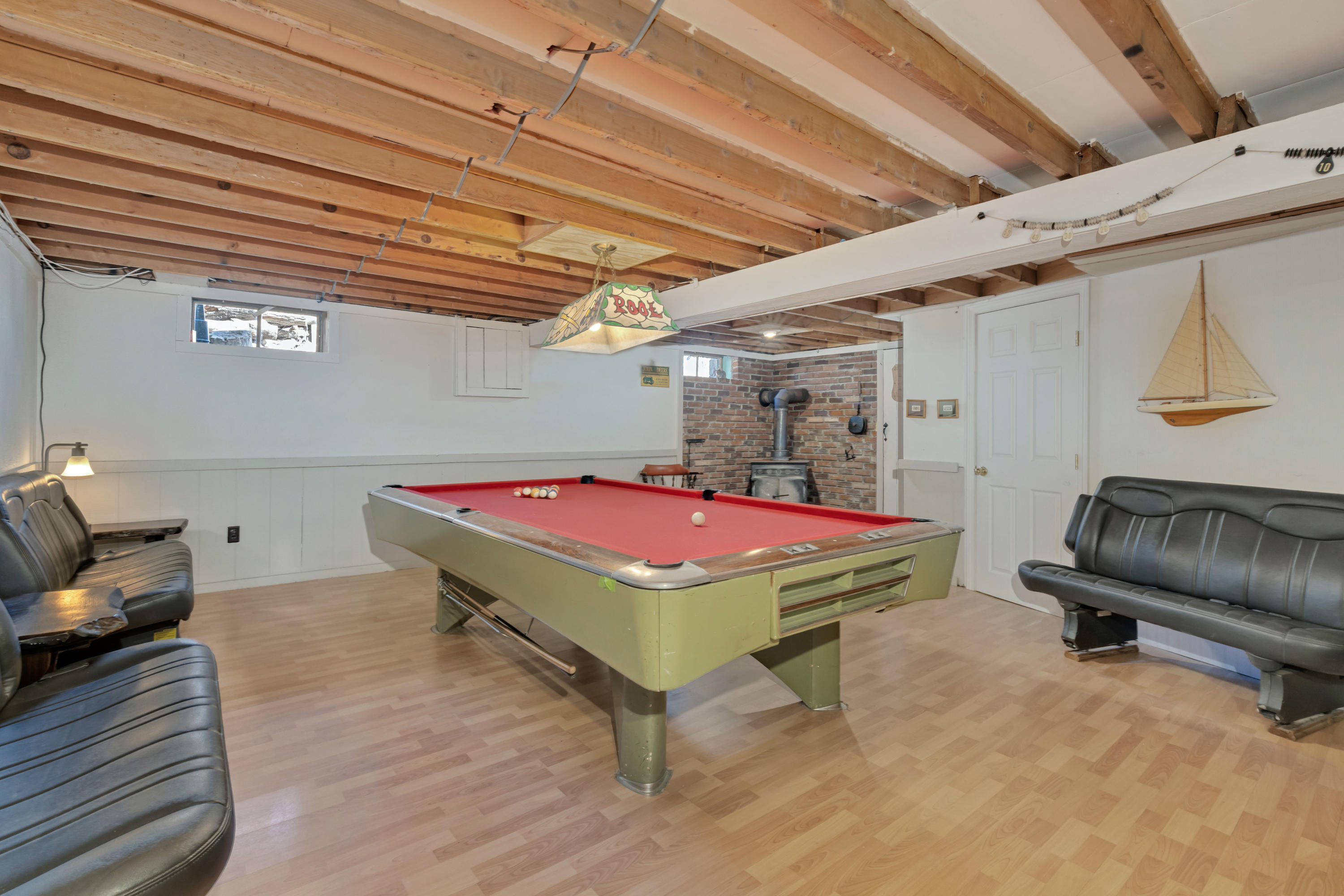 110 Kelley Road Hyannis, MA 02601 - Photo 32 of 49 a room with furniture on wall and a table