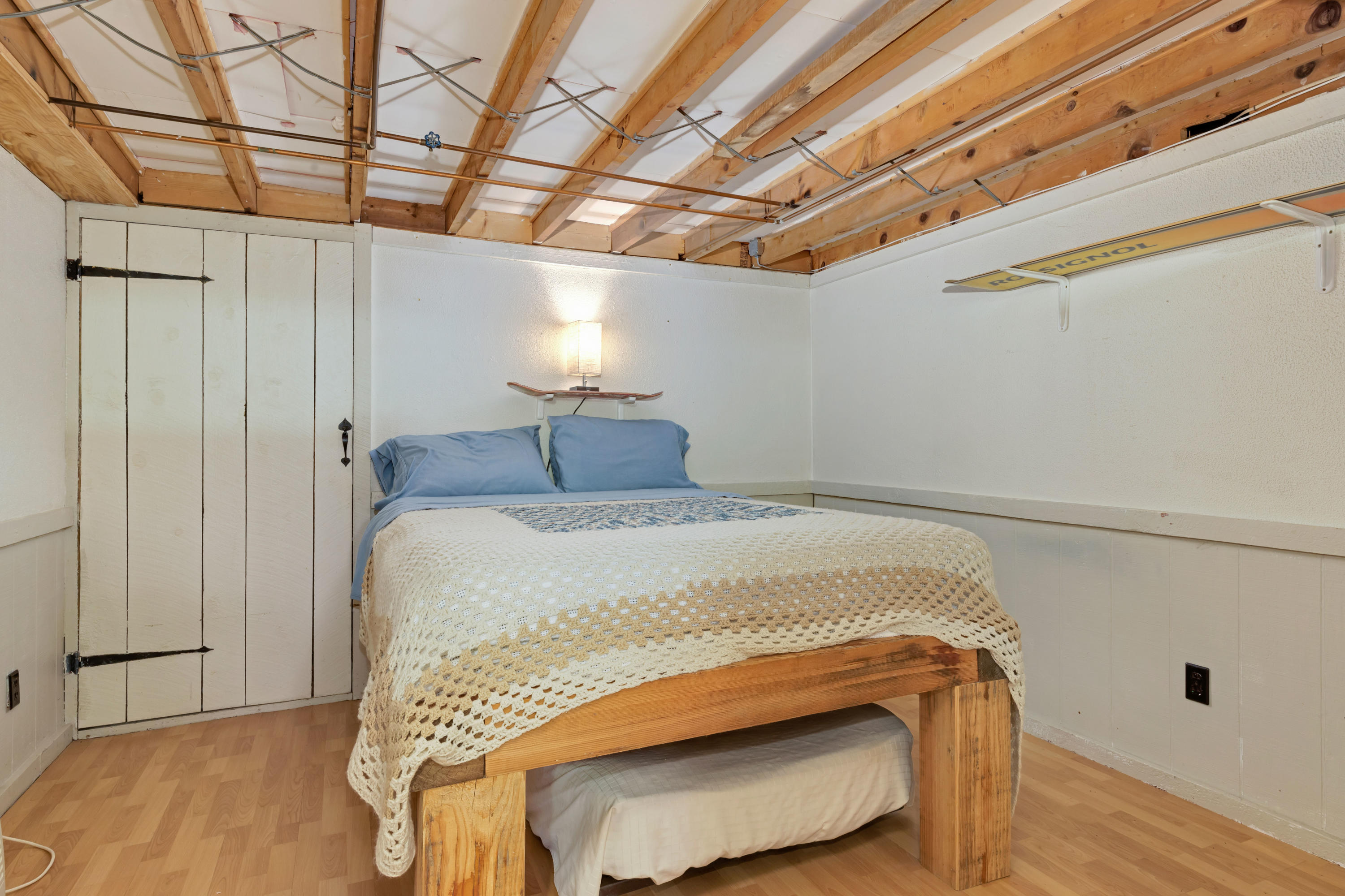 110 Kelley Road Hyannis, MA 02601 - Photo 34 of 49 a bedroom with a bed and wooden floor