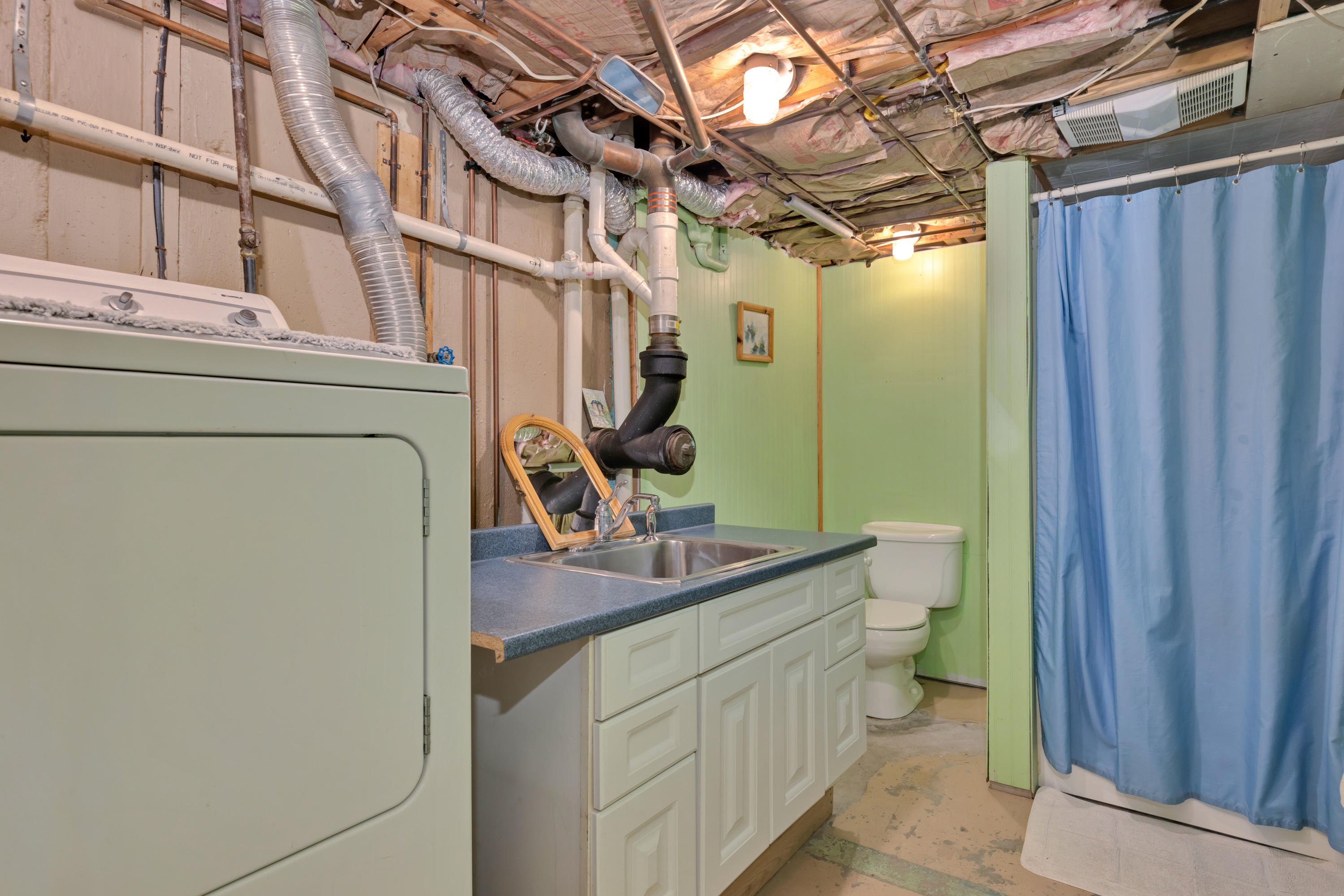 110 Kelley Road Hyannis, MA 02601 - Photo 36 of 49 a bathroom with a sink a toilet and shower