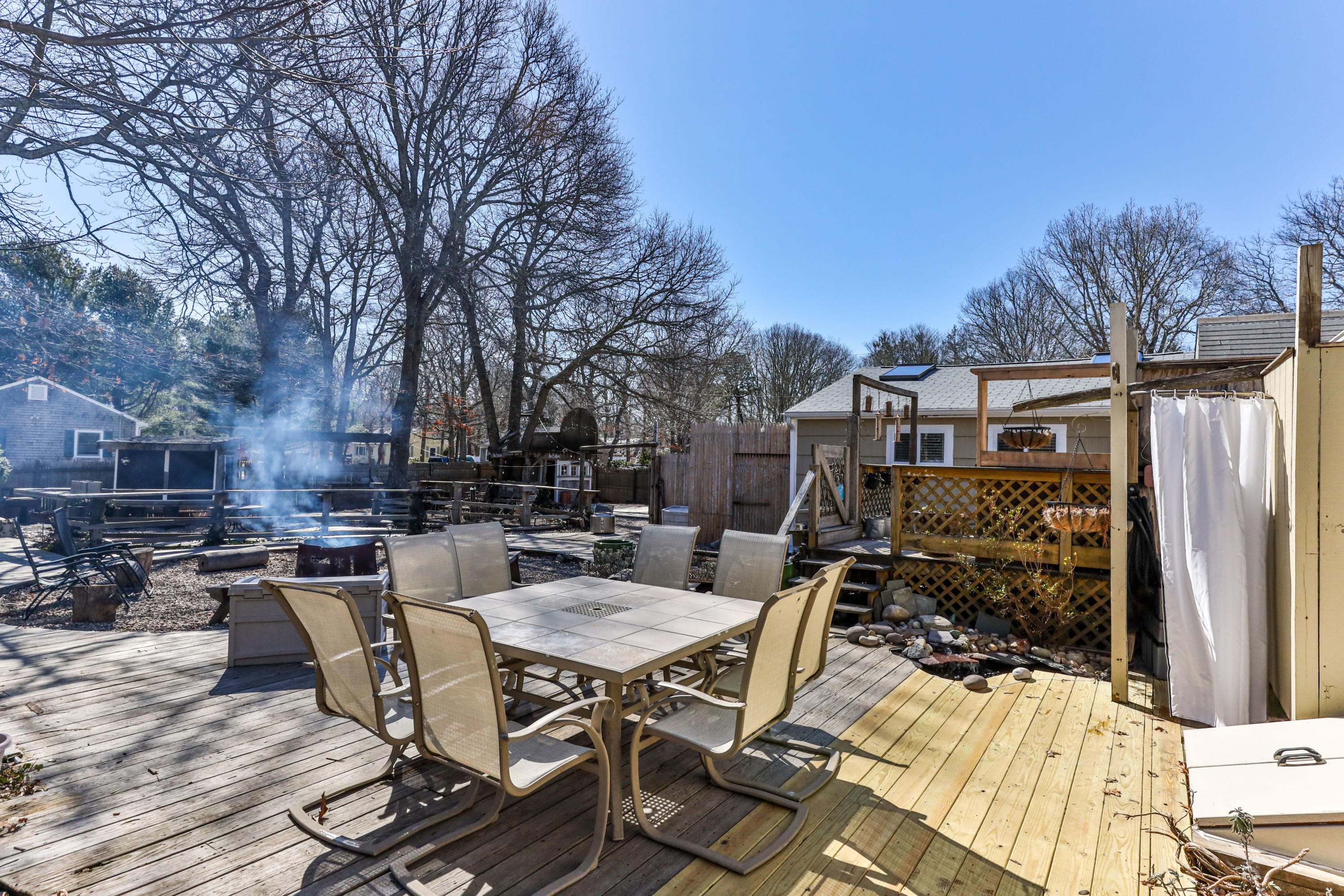 110 Kelley Road Hyannis, MA 02601 - Photo 40 of 49 a view of backyard with seating space and trees