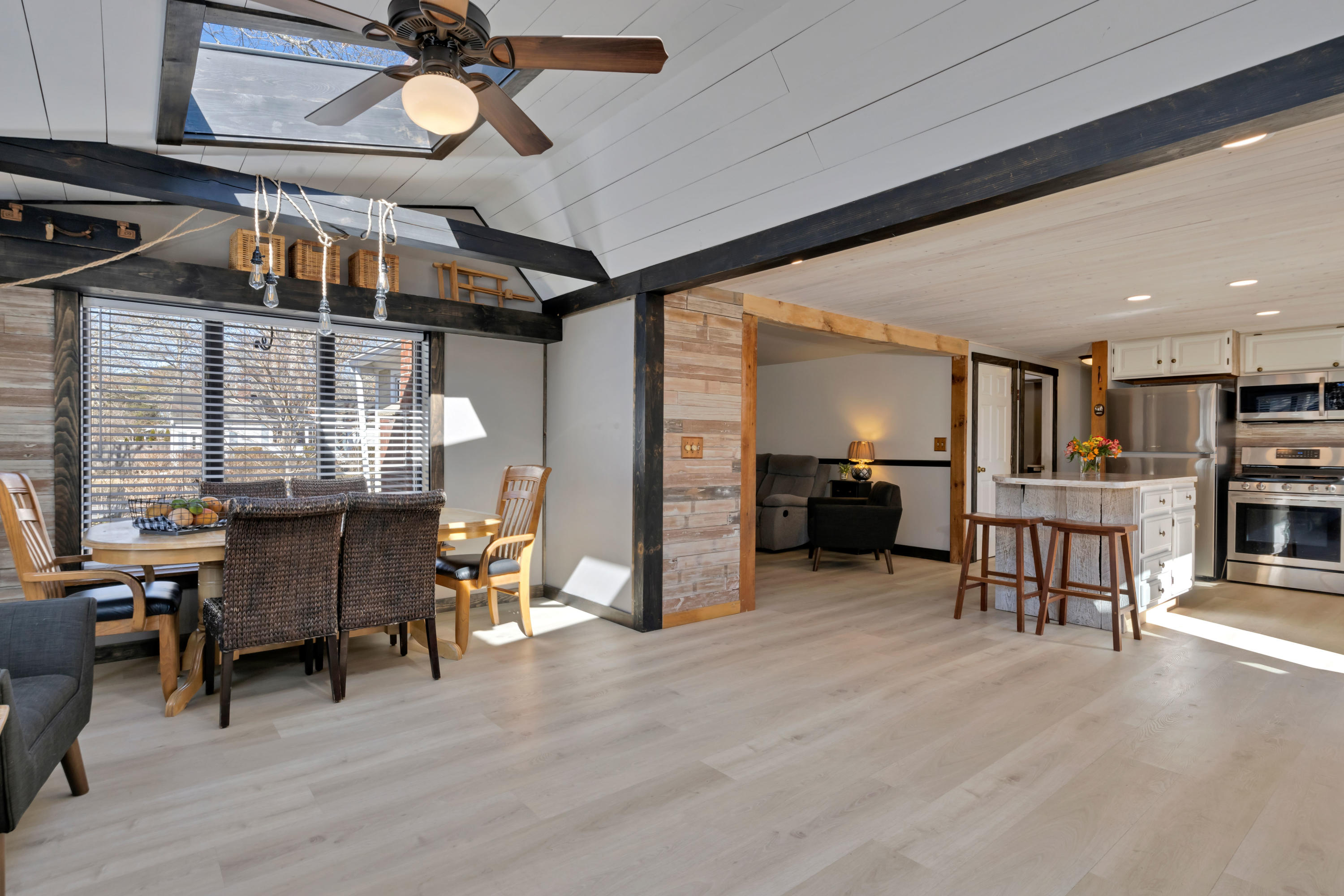 110 Kelley Road Hyannis, MA 02601 - Photo 47 of 49 a living room with furniture and a kitchen view