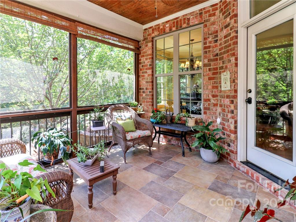 251 Old Post Road Weddington, NC 28173 - Photo 12 of 46 a living room filled with furniture and a potted plant
