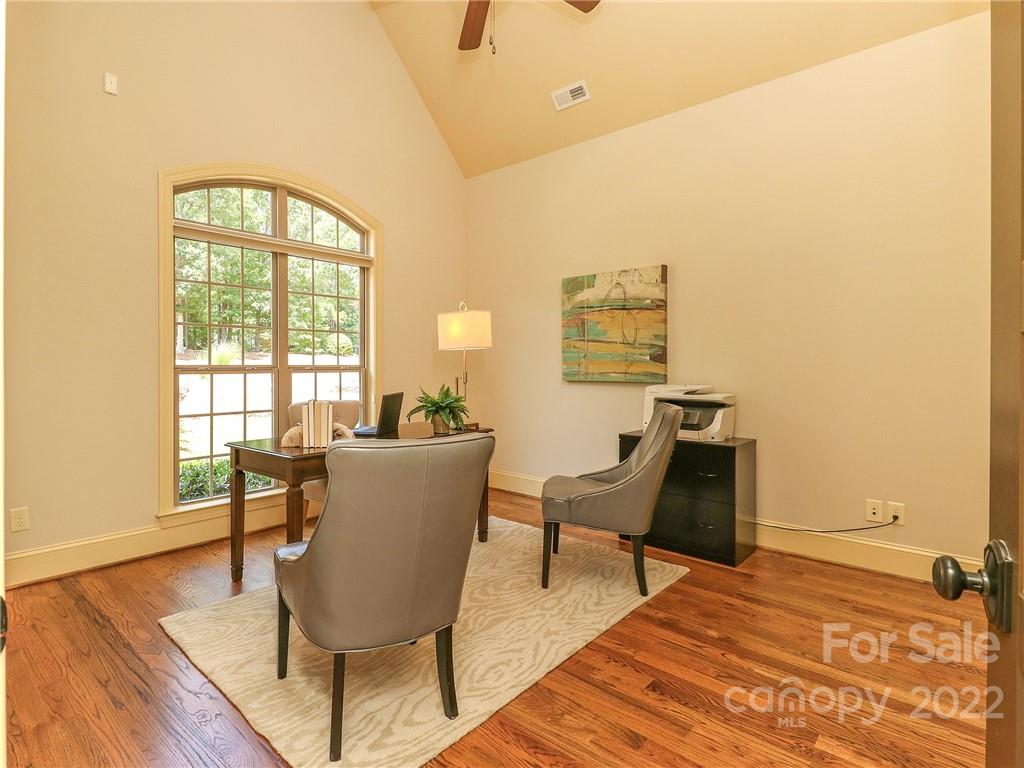 251 Old Post Road Weddington, NC 28173 - Photo 13 of 46 a view of a dining room with furniture and wooden floor