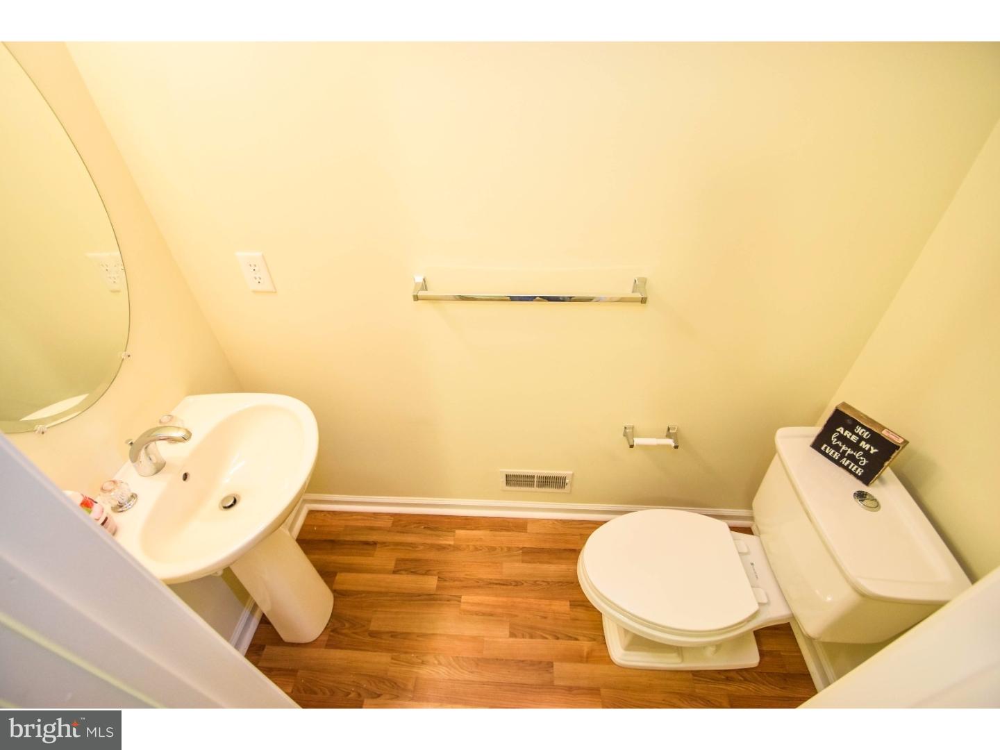 1025 Moore Road Thorofare, NJ 08086 - Photo 24 of 25 a bathroom with a toilet and a mirror
