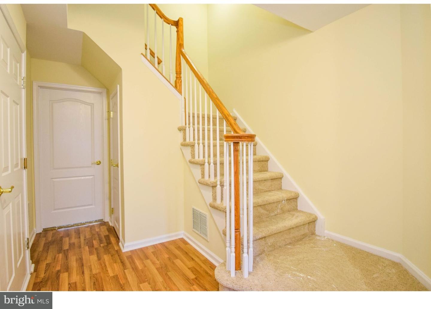 1025 Moore Road Thorofare, NJ 08086 - Photo 8 of 25 a view of entryway with wooden floor