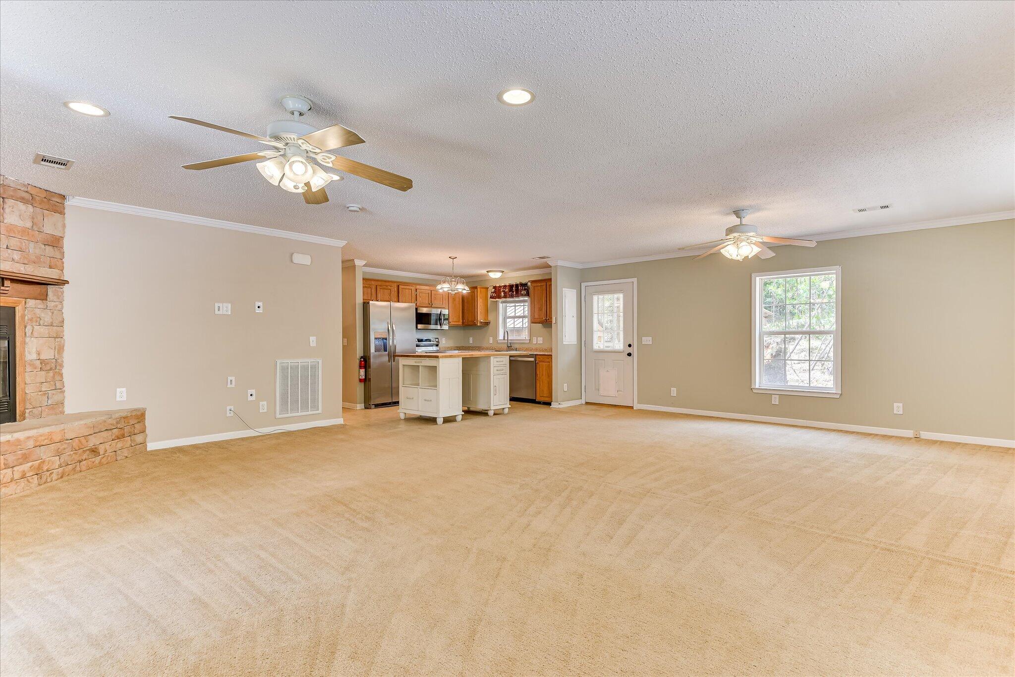 1405 Garrett Road Clarks Hill, SC 29821 - Photo 7 of 51 a view of a livingroom with a ceiling fan and window