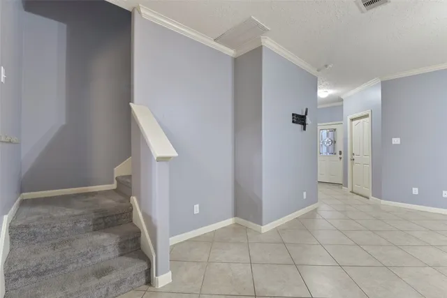 an empty room with an entryway