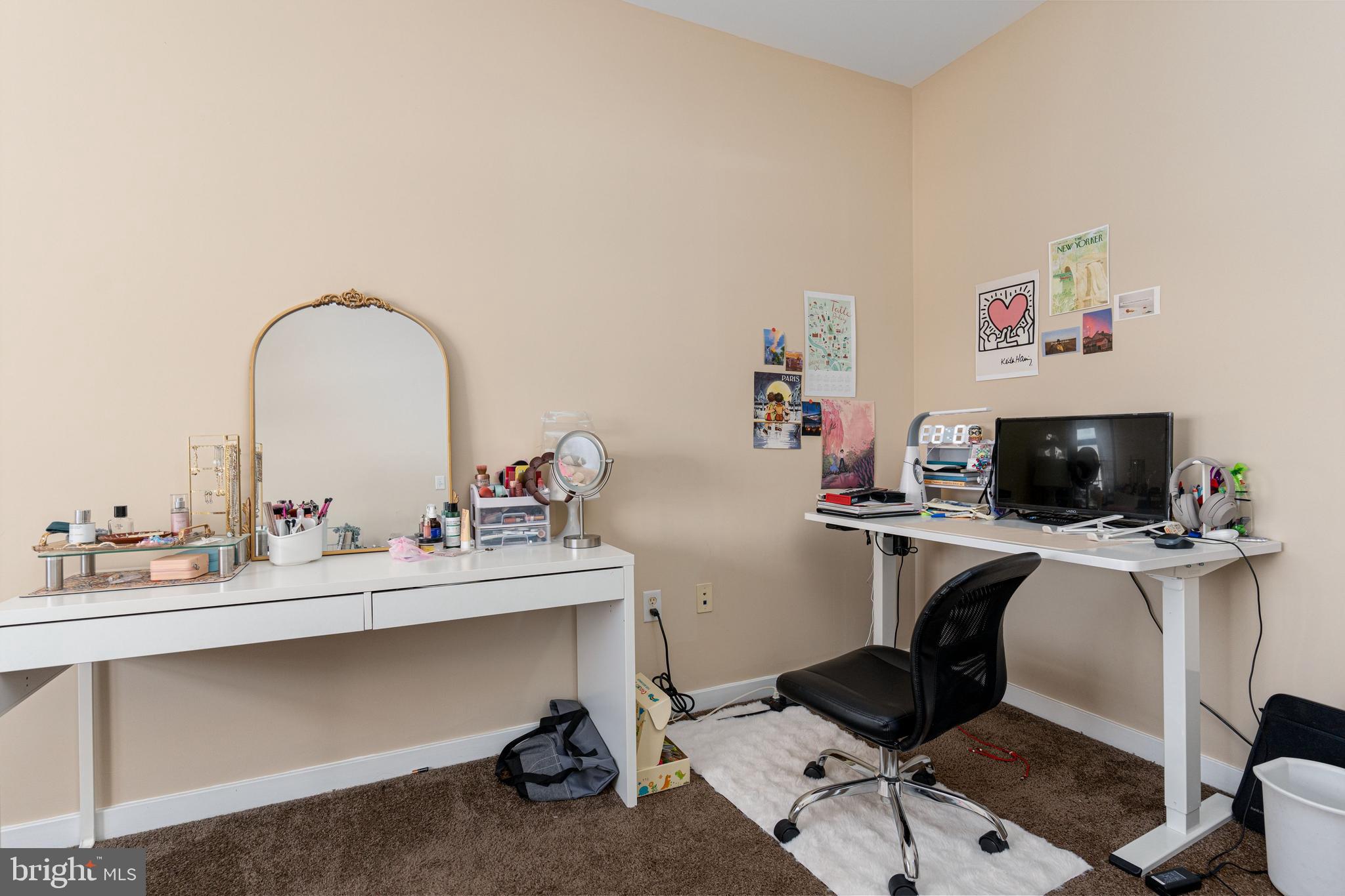 3201 St Paul Street, Unit 422 Baltimore, MD 21218 - Photo 19 of 27 a view of a workspace with furniture