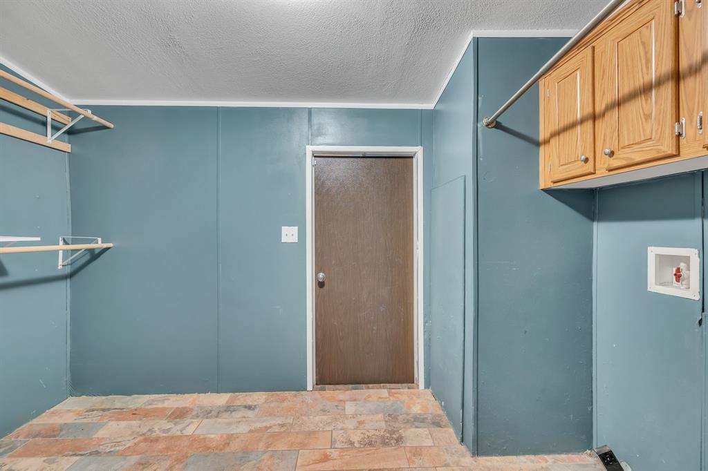 1350 Stephens Road Millsap, TX 76066 - Photo 18 of 29 a bedroom with a bed and a window