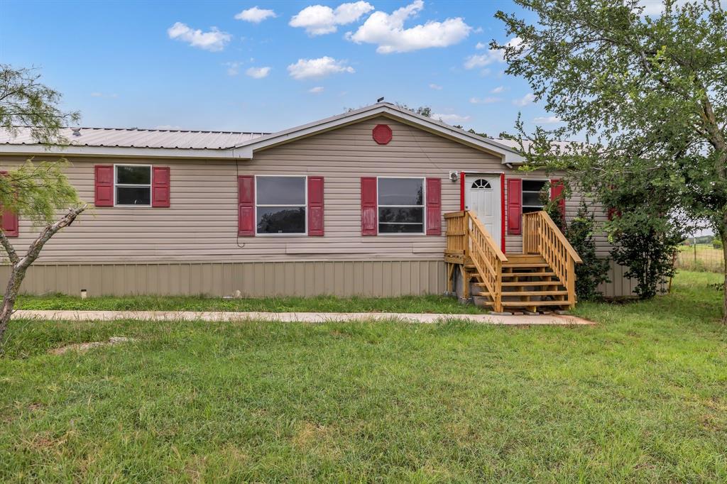 1350 Stephens Road Millsap, TX 76066 - Photo 3 of 29 a view of a house with a yard
