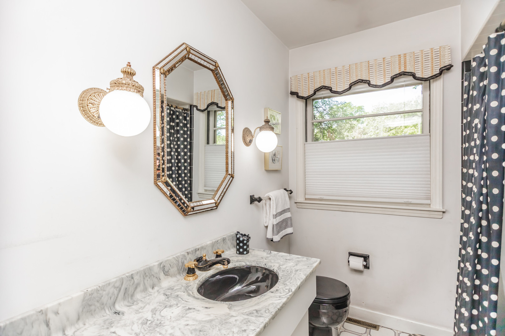 8080 Wolf Road Burr Ridge, IL 60527 - Photo 24 of 73 a bathroom with a sink mirror and toilet