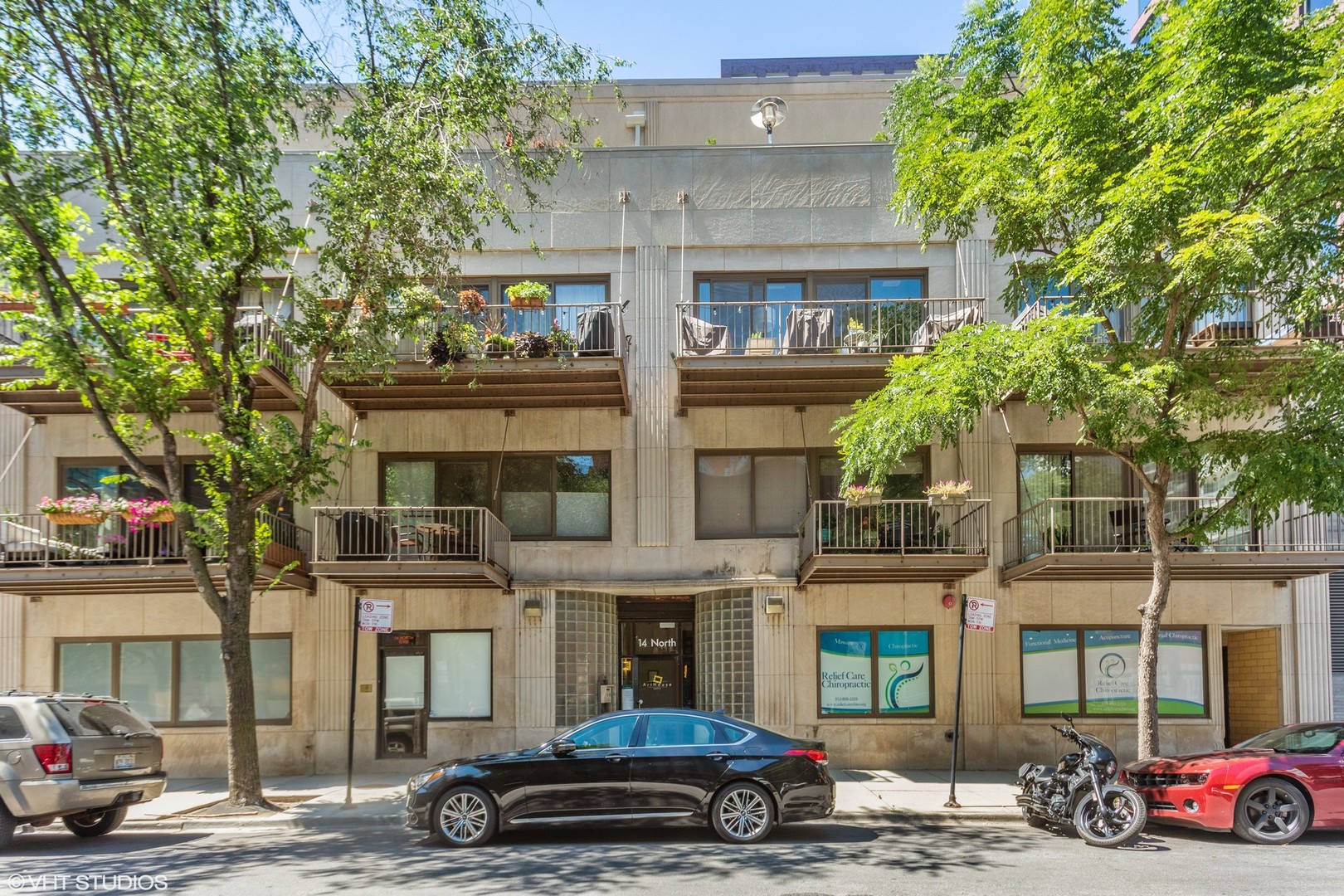 14 North Sangamon Street, Unit 309 Chicago, IL 60607 - Photo 2 of 39 a car parked in front of a building