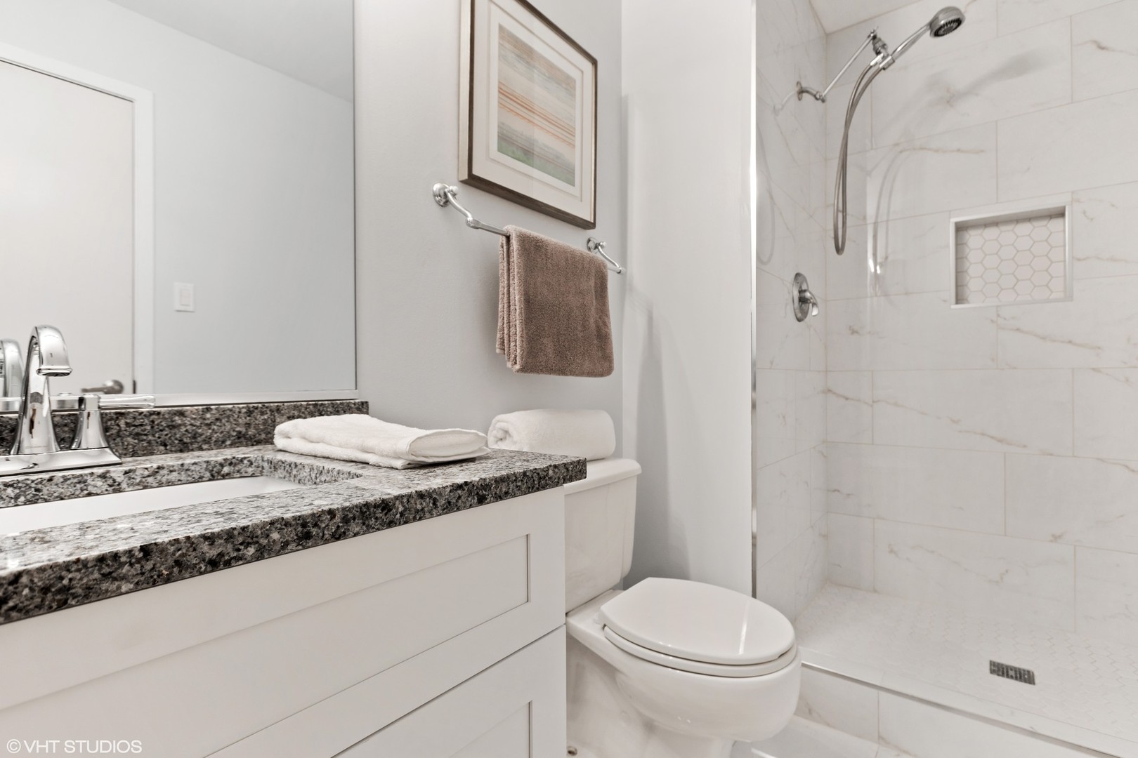 14 North Sangamon Street, Unit 309 Chicago, IL 60607 - Photo 17 of 39 a bathroom with a granite countertop sink toilet and shower