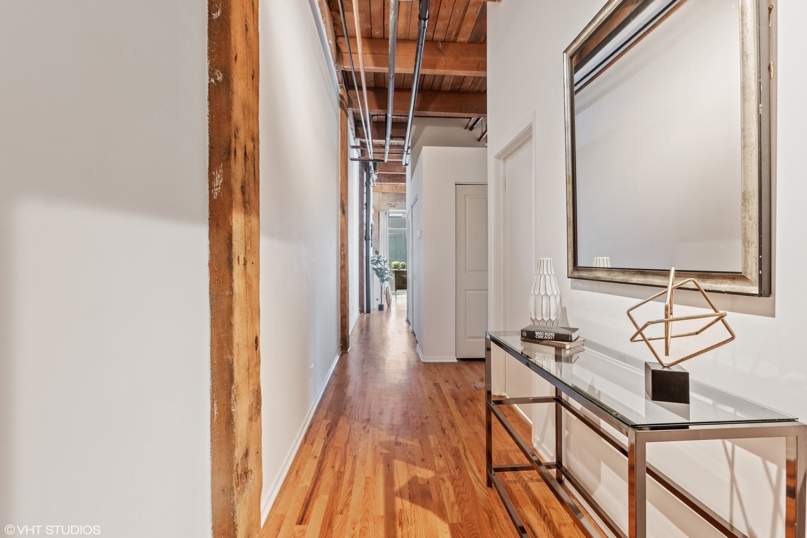 14 North Sangamon Street, Unit 309 Chicago, IL 60607 - Photo 3 of 39 a bathroom with a sink and a mirror