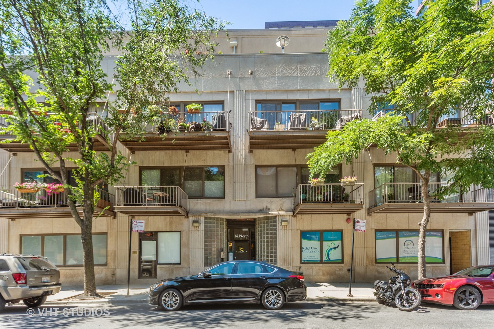 14 North Sangamon Street, Unit 309 Chicago, IL 60607 - Photo 21 of 39 a car parked in front of a building