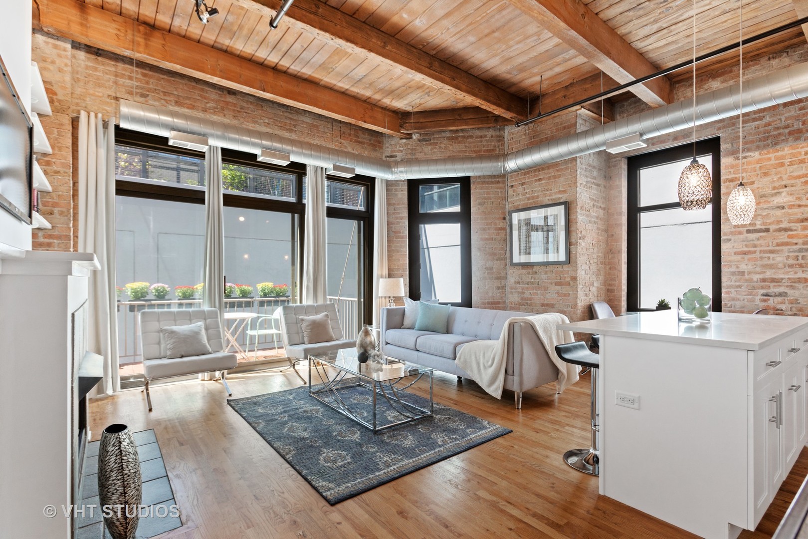14 North Sangamon Street, Unit 309 Chicago, IL 60607 - Photo 23 of 39 a living room with furniture and a large window