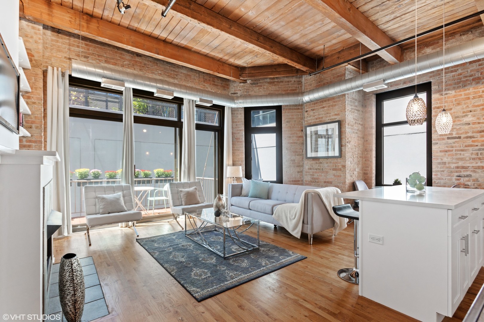 14 North Sangamon Street, Unit 309 Chicago, IL 60607 - Photo 4 of 39 a living room with furniture and a large window