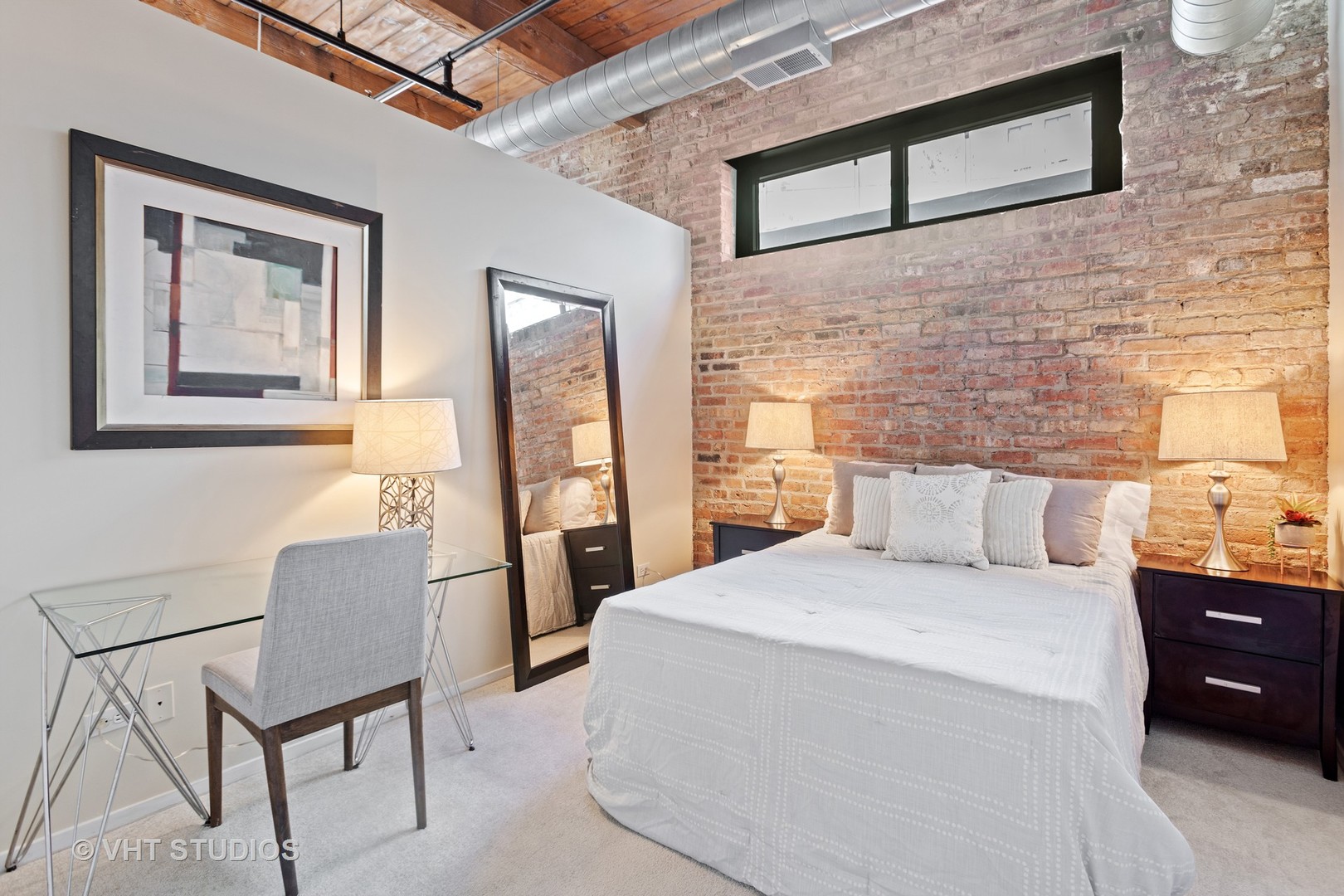 14 North Sangamon Street, Unit 309 Chicago, IL 60607 - Photo 35 of 39 a living room with a couch and a dining table