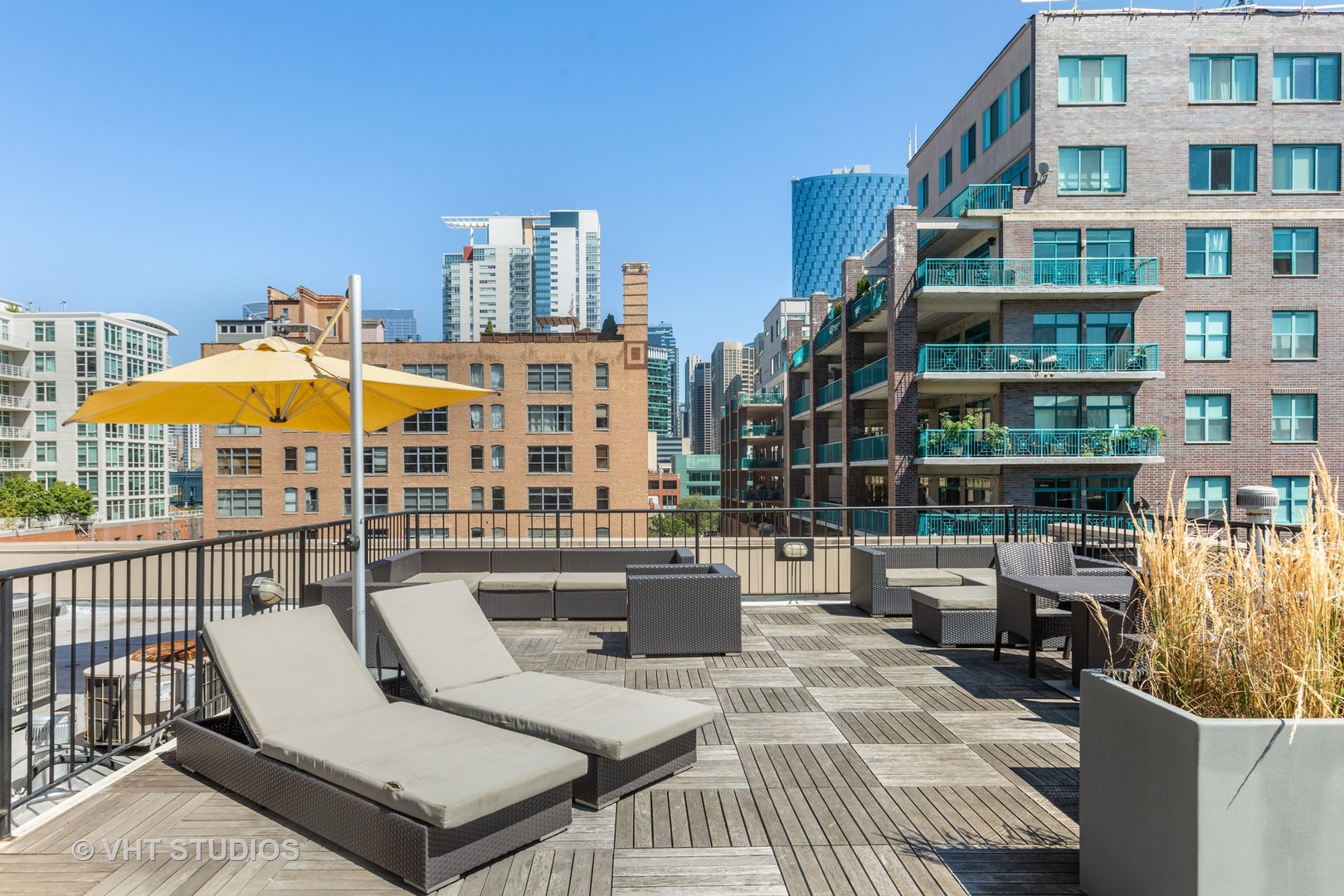 14 North Sangamon Street, Unit 309 Chicago, IL 60607 - Photo 38 of 39 a roof deck with couch and chairs