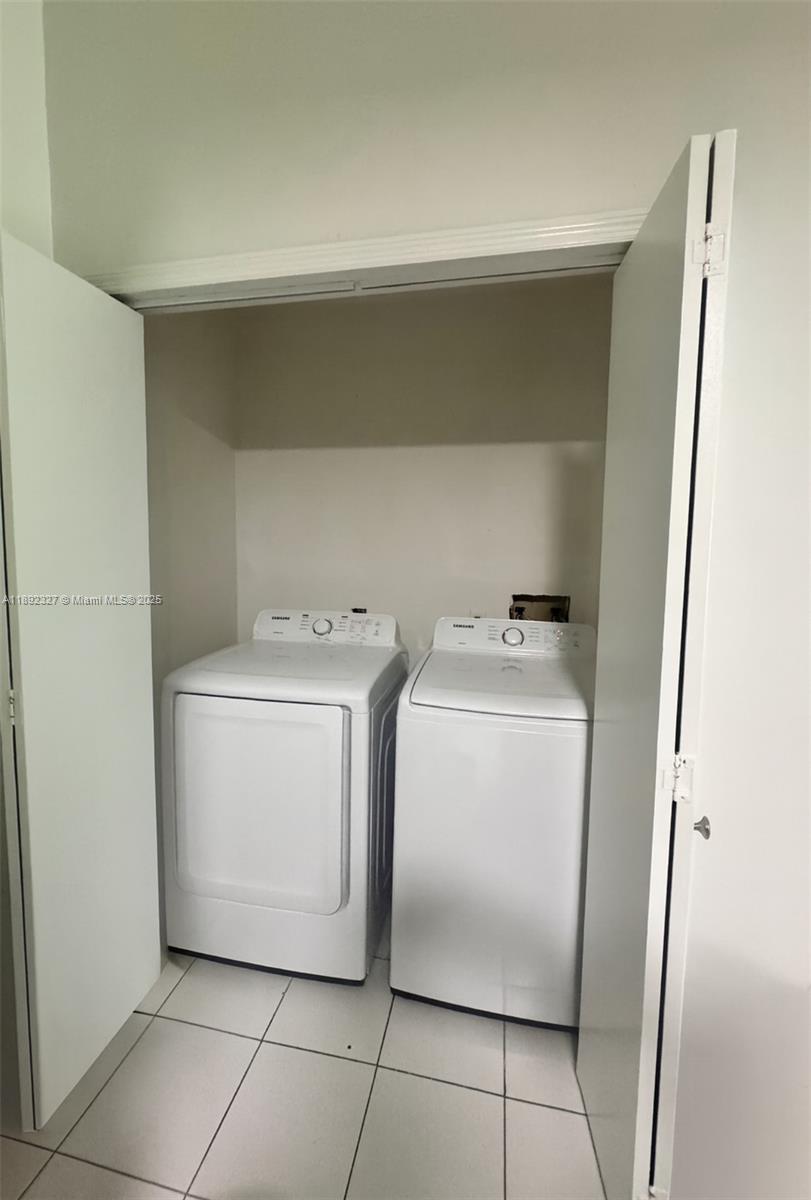 2849 West 71st Street Hialeah, FL 33018 - Photo 12 of 22 a utility room with dryer and washer