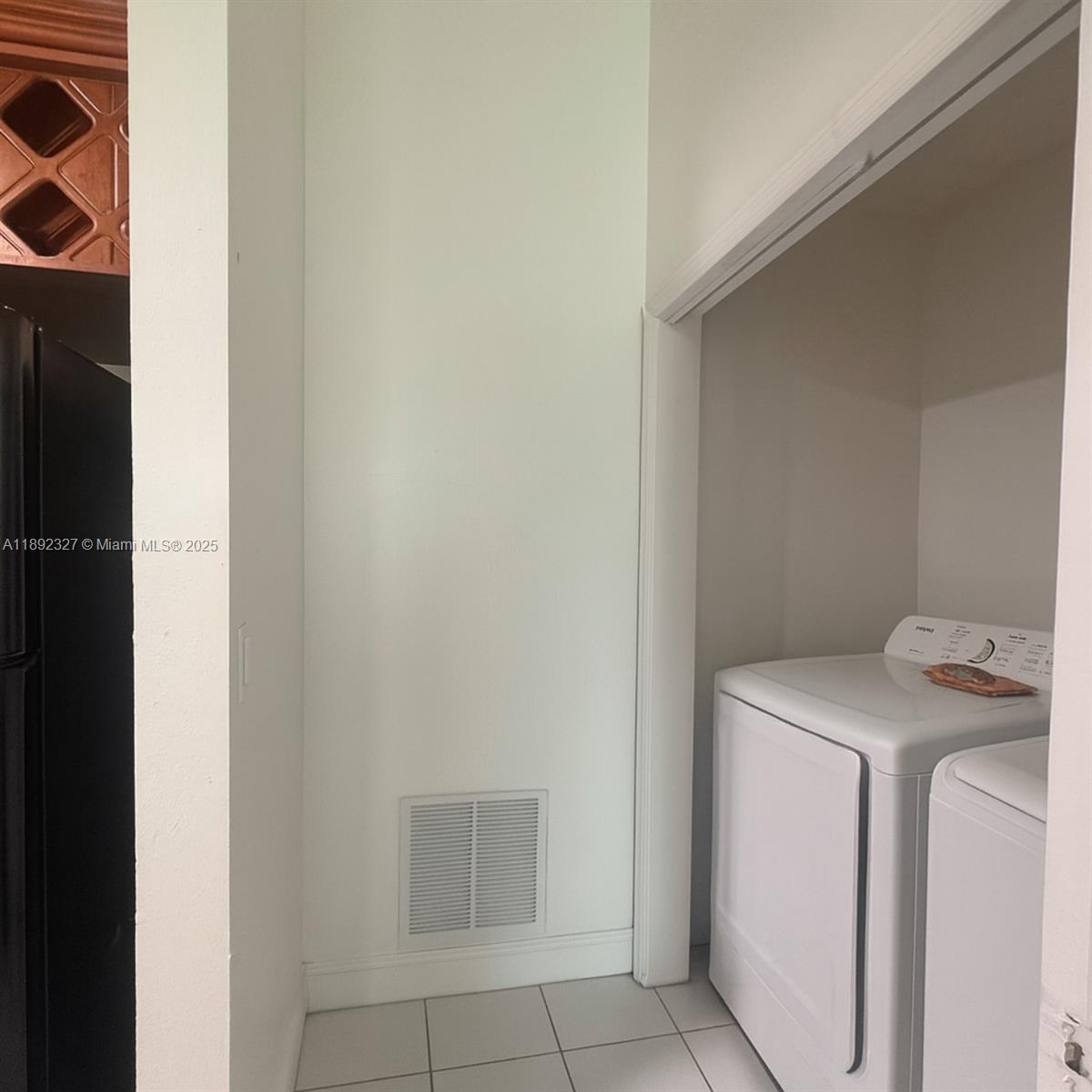 2849 West 71st Street Hialeah, FL 33018 - Photo 13 of 22 a utility room with dryer and washer