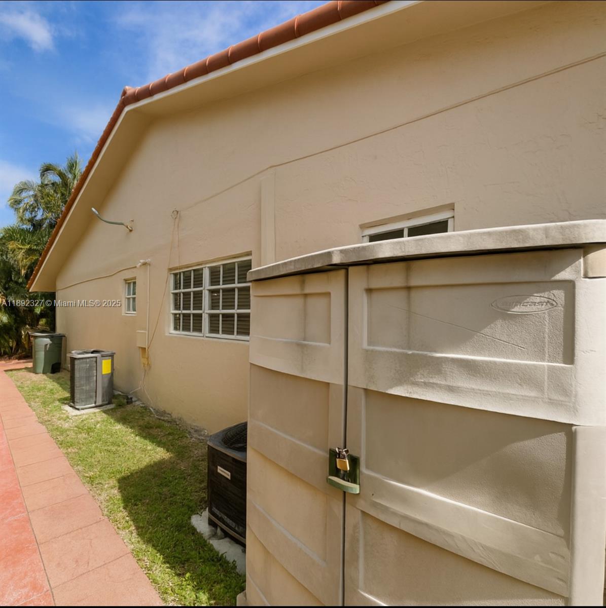 2849 West 71st Street Hialeah, FL 33018 - Photo 19 of 22 a view of a house with a door