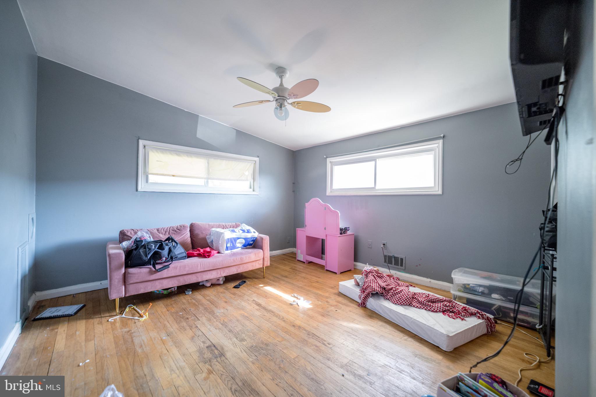 4125 Ronis Road Pikesville, MD 21208 - Photo 8 of 40 a bedroom with furniture and a window