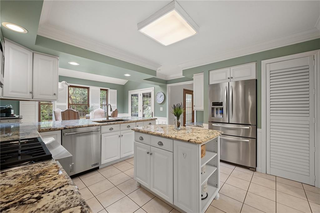 2779 Clearview Road Allison Park, PA 15101 - Photo 7 of 49 Well-appointed kitchen with JennAir and KitchenAid appliances and exotic granite countertops.