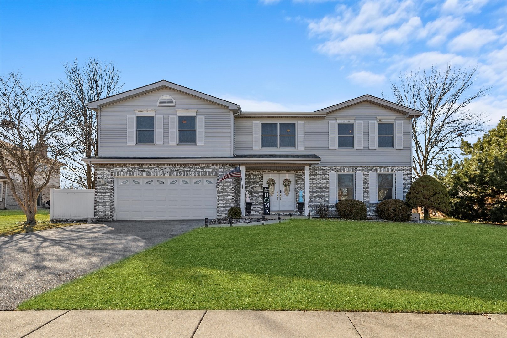 21170 Deerpath Road Frankfort, IL 60423 - Photo 1 of 26 a front view of a house with a yard