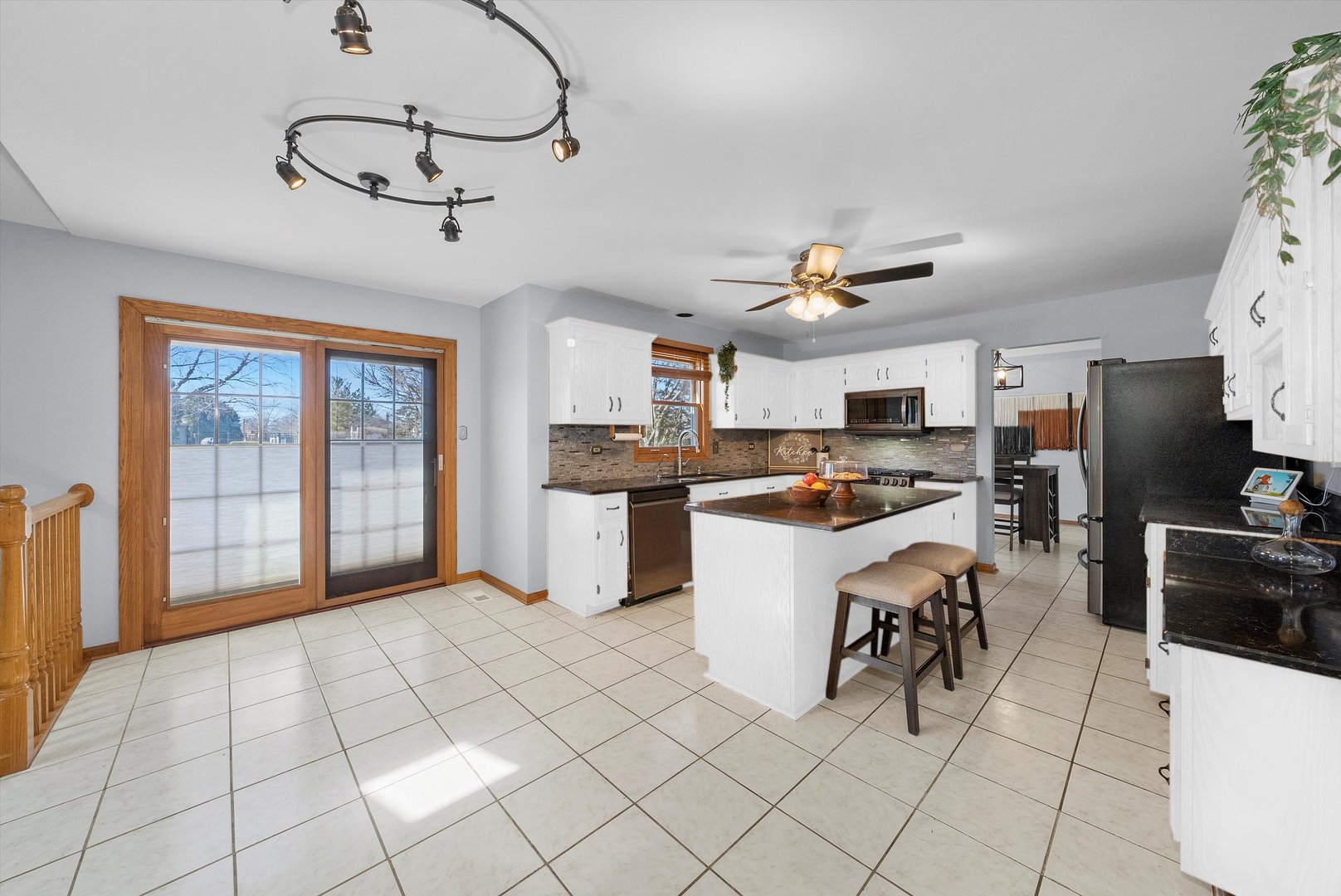 21170 Deerpath Road Frankfort, IL 60423 - Photo 3 of 26 a kitchen with stainless steel appliances kitchen island granite countertop a sink and cabinets