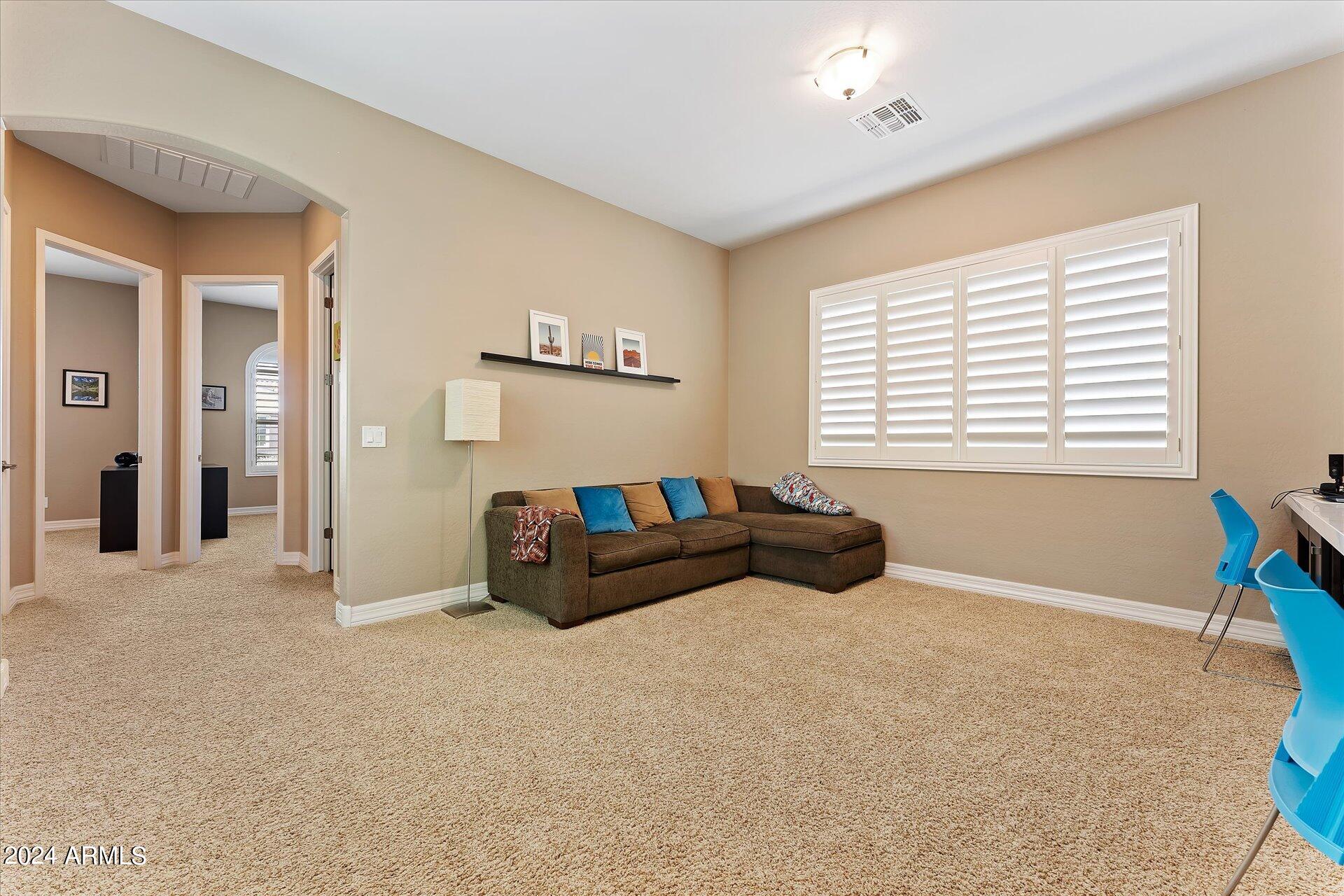 15741 West Harvard Street Goodyear, AZ 85395 - Photo 30 of 47 31-031-family-room