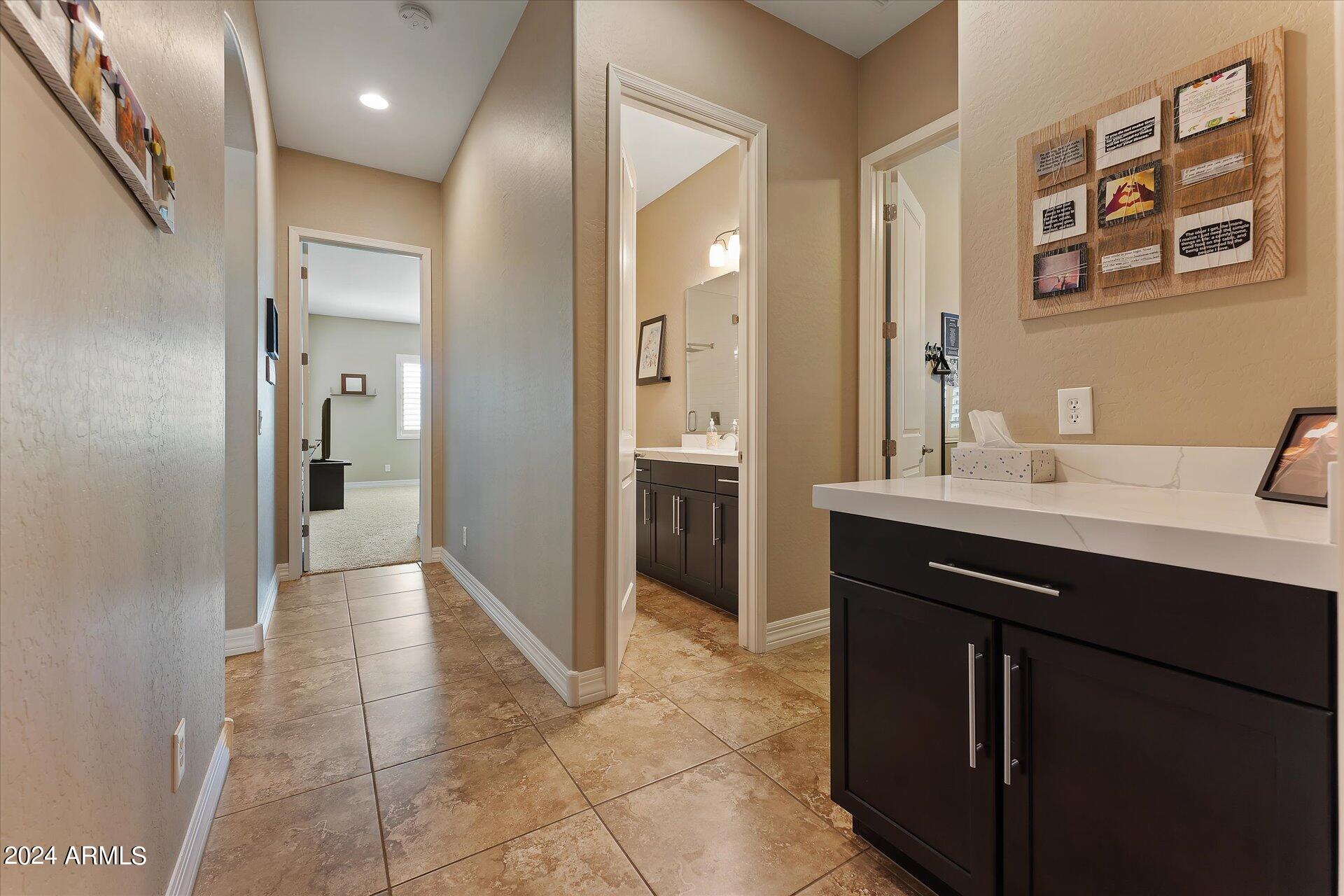 15741 West Harvard Street Goodyear, AZ 85395 - Photo 37 of 47 38-038-garage-entry