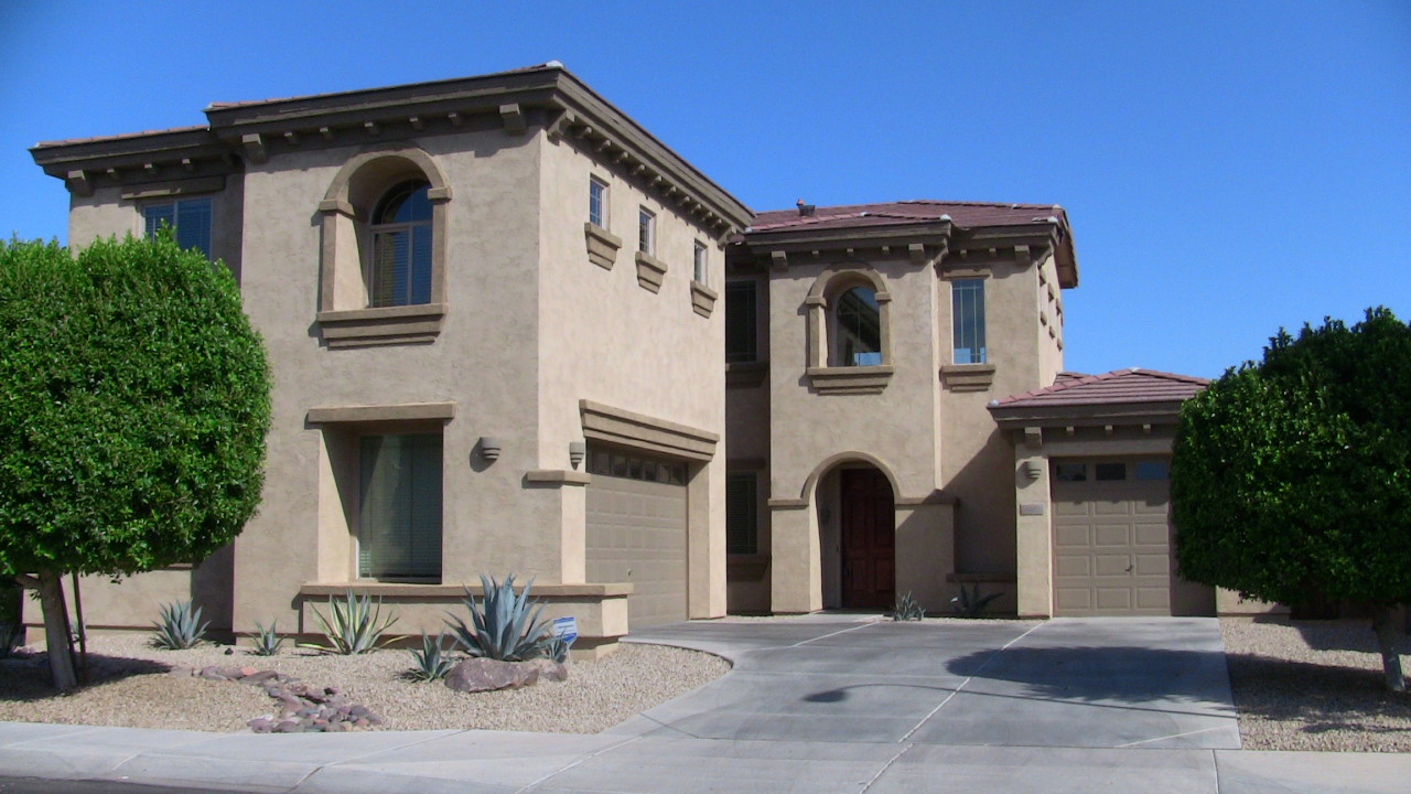 9302 West Rascon Loop Phoenix, AZ 85037 - Photo 1 of 20 Front