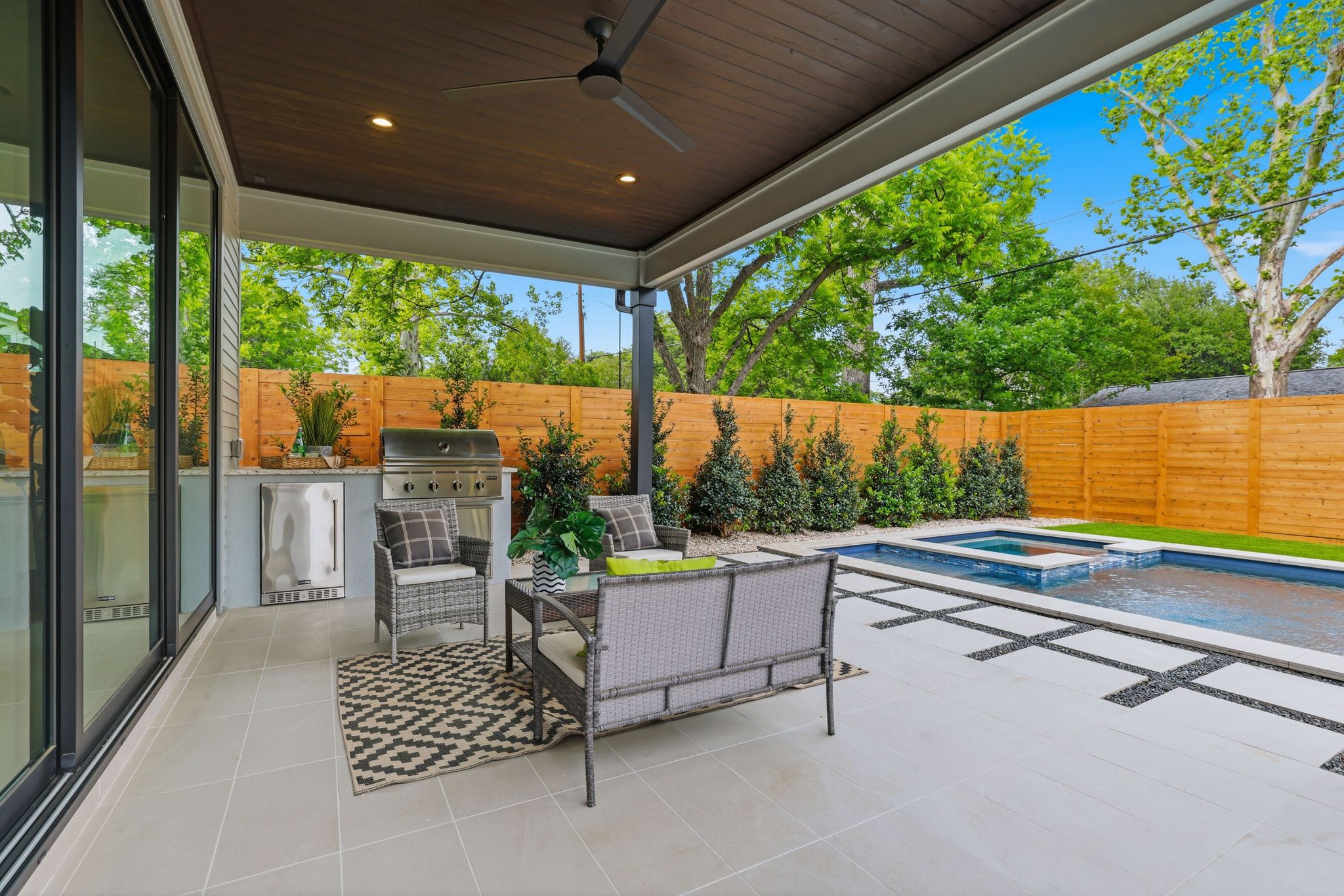 6611 Lexington Road Austin, TX 78757 - Photo 32 of 37 Covered patio with a dark wood-finish ceiling, recessed lighting, and ceiling fan