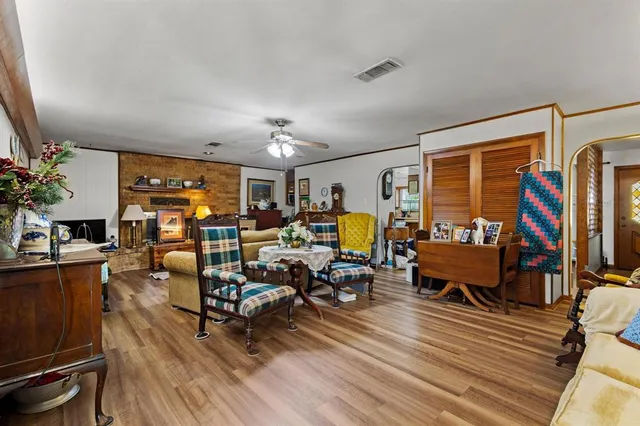 a view of a living room and dining room