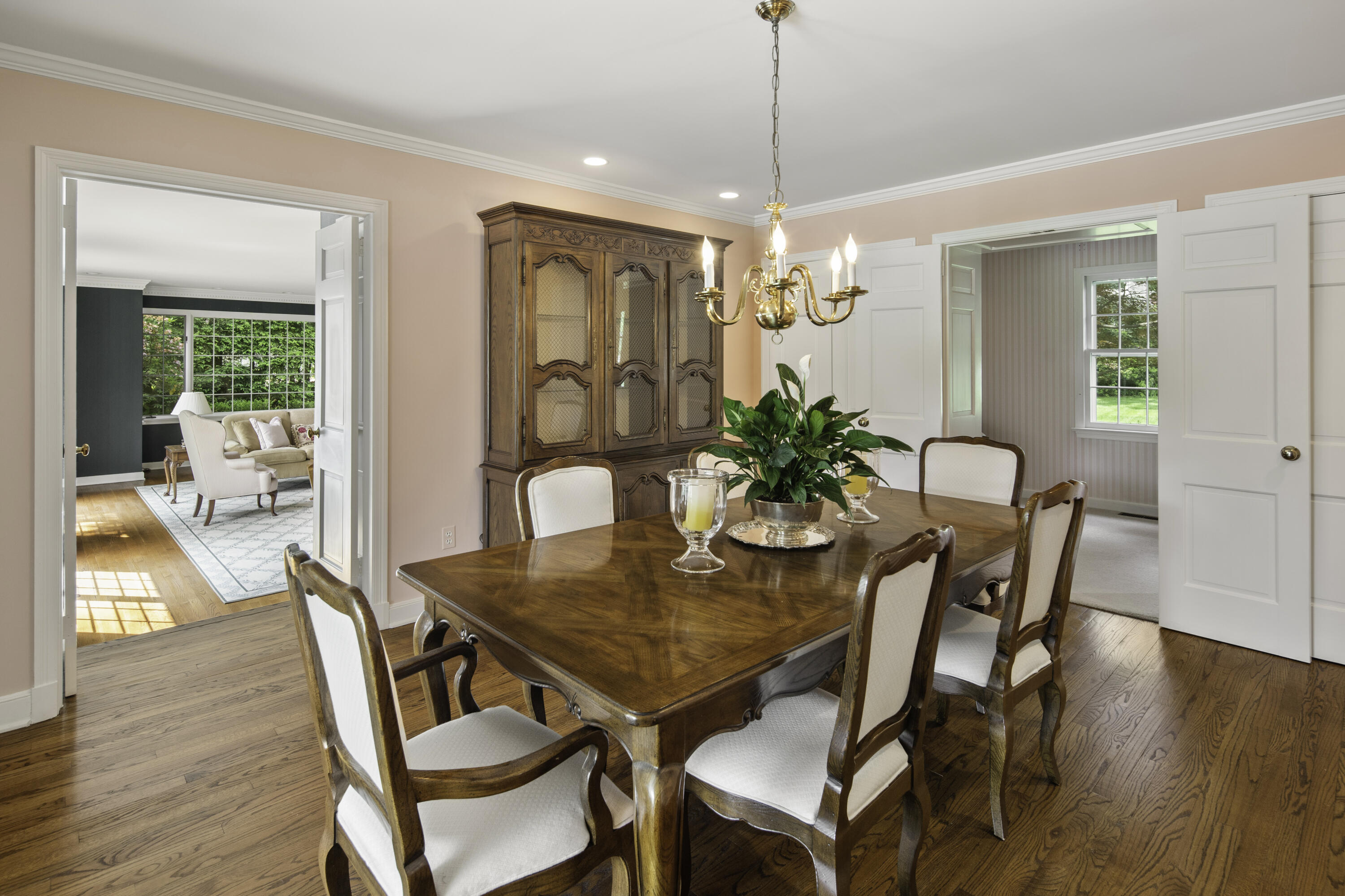 246 White Oak Shade Road New Canaan, CT 06840 - Photo 11 of 38 a view of a dining room with furniture window and wooden floor