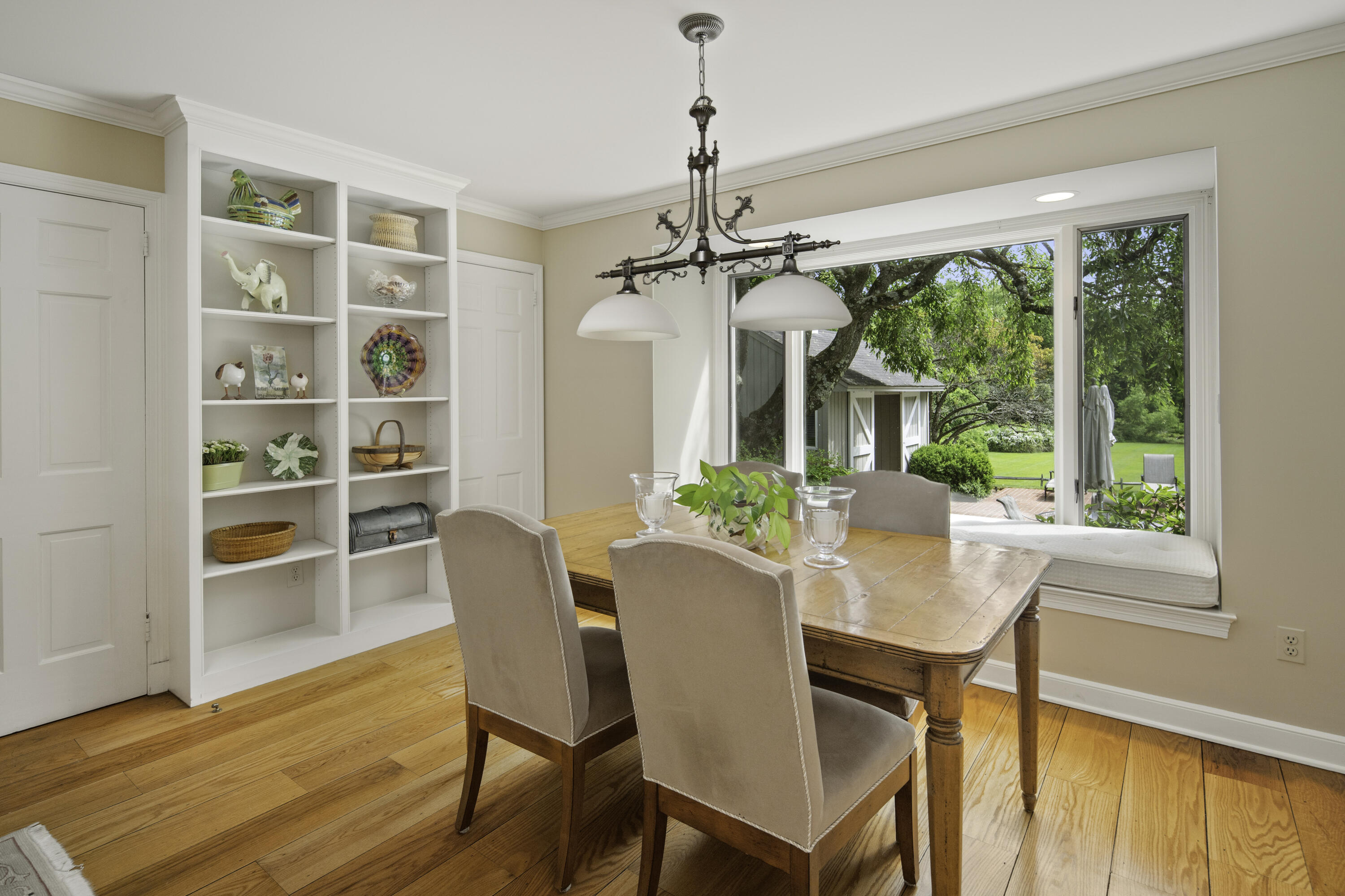 246 White Oak Shade Road New Canaan, CT 06840 - Photo 16 of 38 a view of a dining room with furniture window and wooden floor