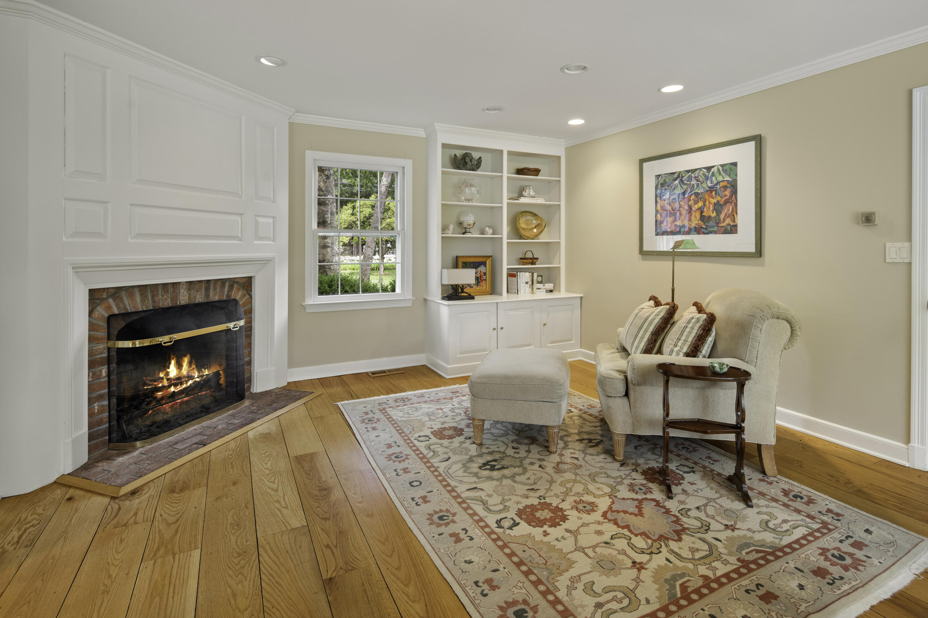 246 White Oak Shade Road New Canaan, CT 06840 - Photo 18 of 38 a living room with furniture and a fireplace