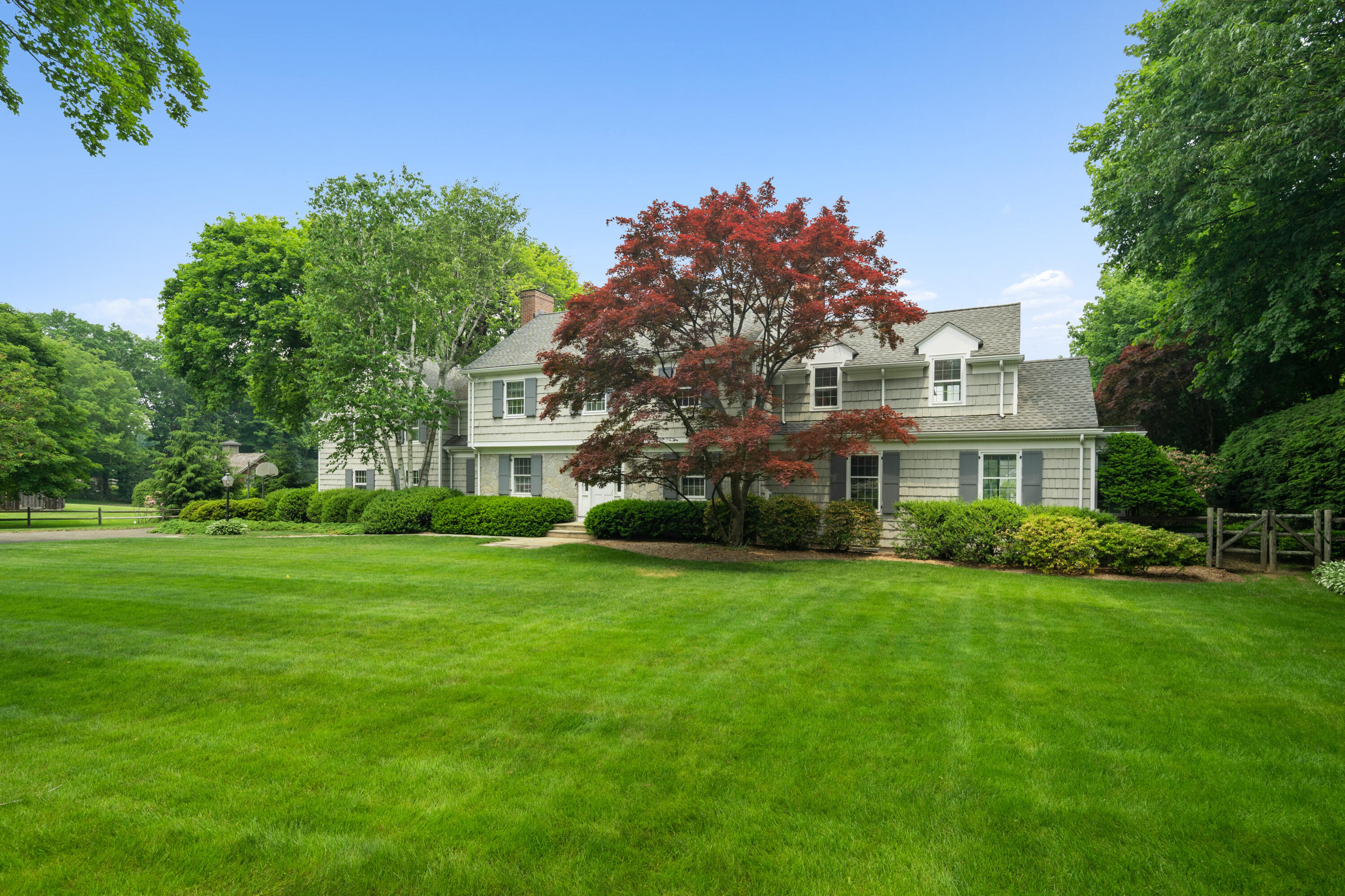 246 White Oak Shade Road New Canaan, CT 06840 - Photo 2 of 38 a view of a big yard of front a house