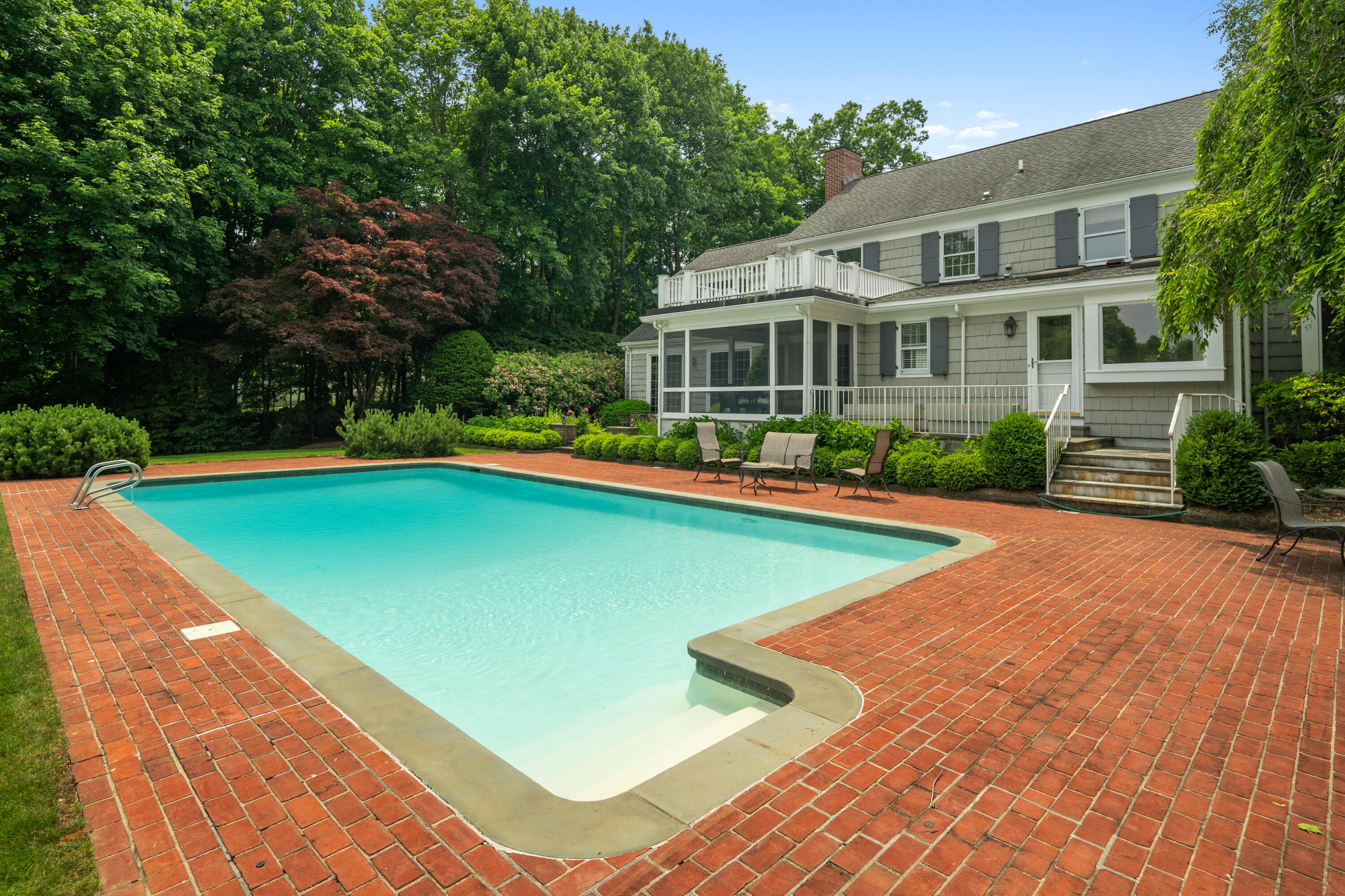 246 White Oak Shade Road New Canaan, CT 06840 - Photo 31 of 38 a view of a house with swimming pool and a yard