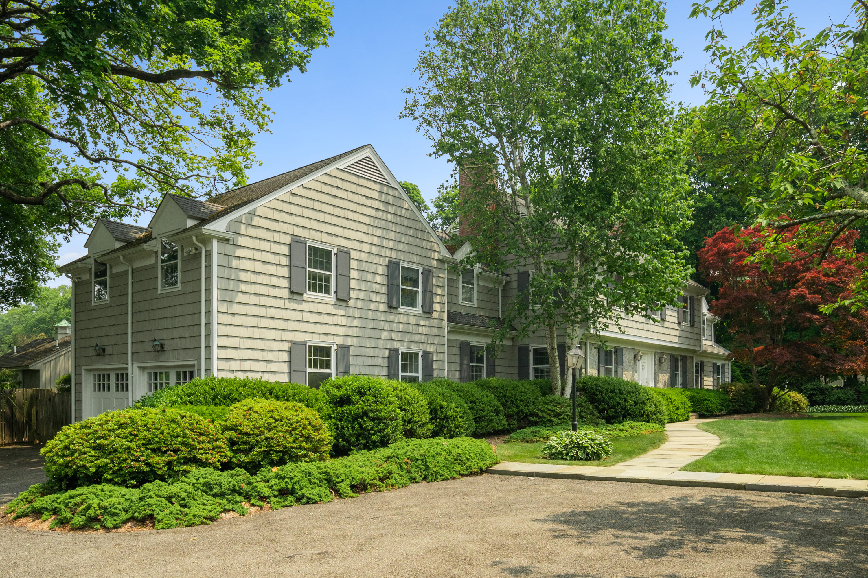 246 White Oak Shade Road New Canaan, CT 06840 - Photo 4 of 38 a view of a house with a yard