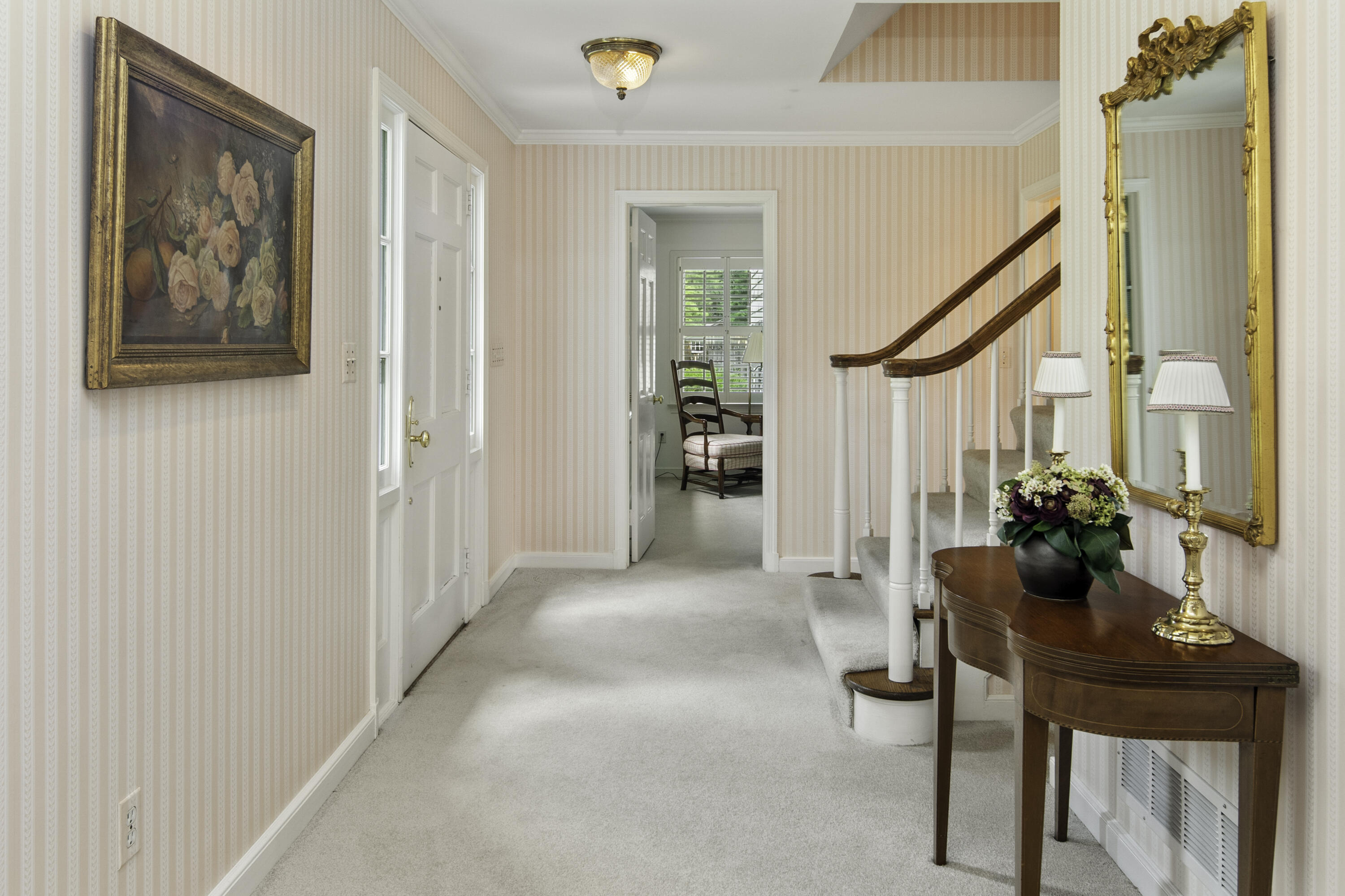 246 White Oak Shade Road New Canaan, CT 06840 - Photo 7 of 38 a view of a hallway with furniture and front door