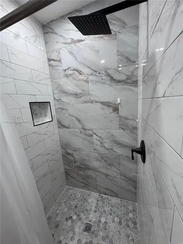 an empty room with wooden floor