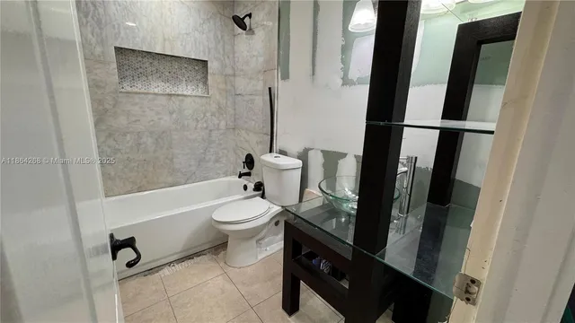 a view of room with wooden floor