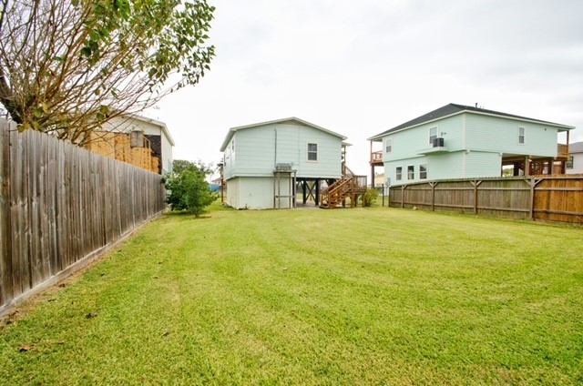 1112 7th Street San Leon, TX 77539 - Photo 13 of 14 a view of a house with a yard