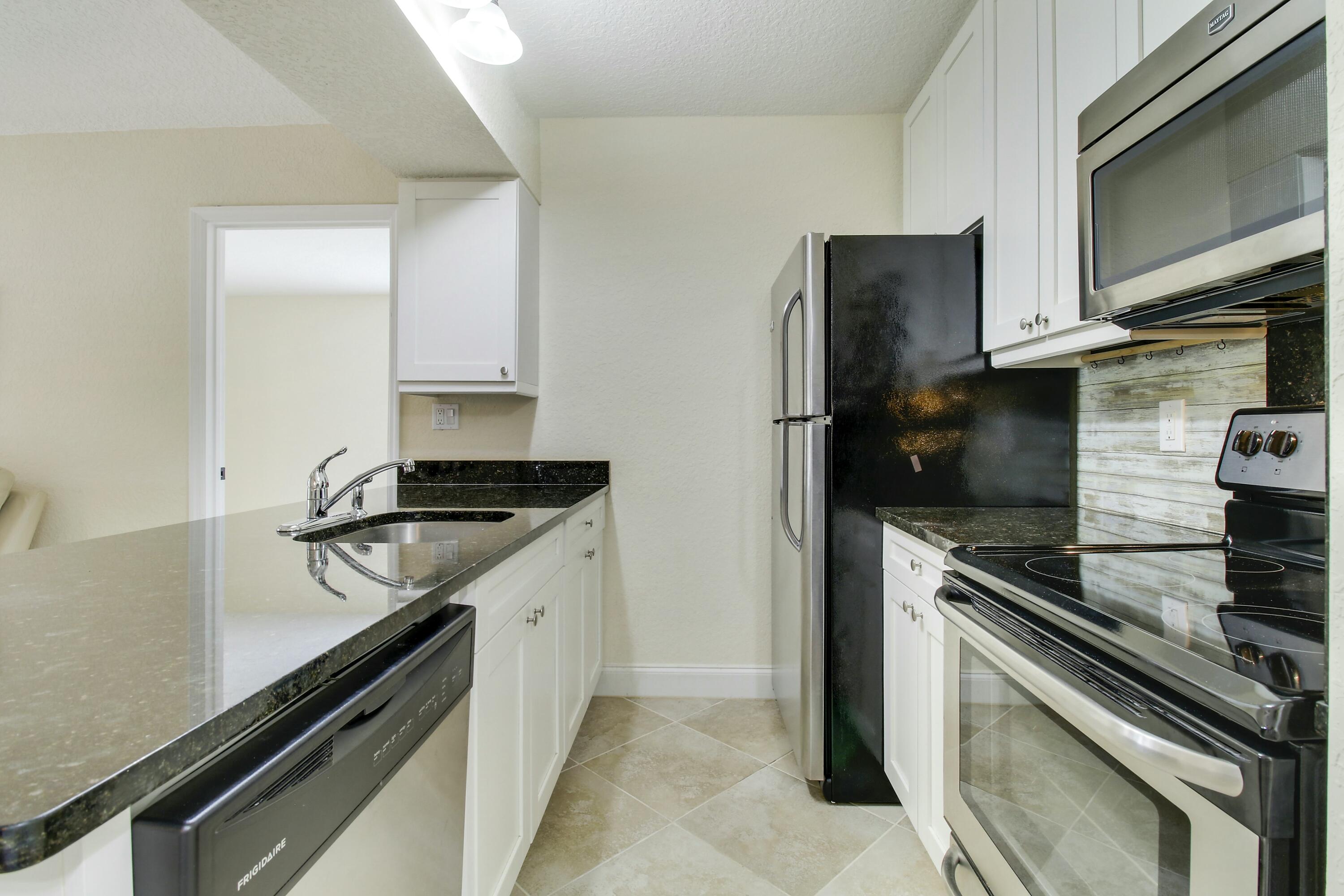 6285 Chasewood Drive, Unit A Jupiter, FL 33458 - Photo 11 of 29 tempImageXHKvUt